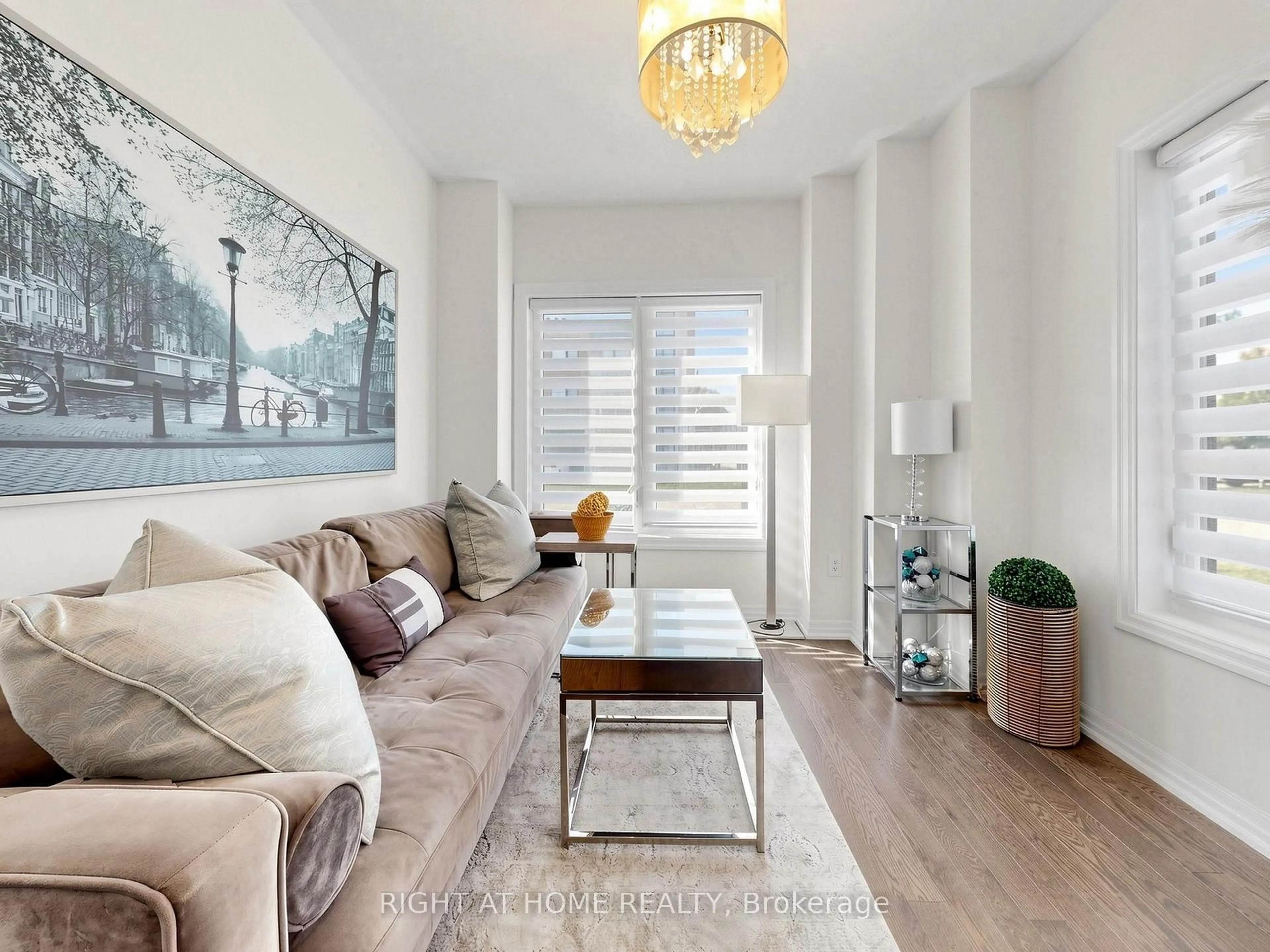 Living room with furniture, wood/laminate floor for 65 Allure St, Newmarket Ontario L3X 0L1