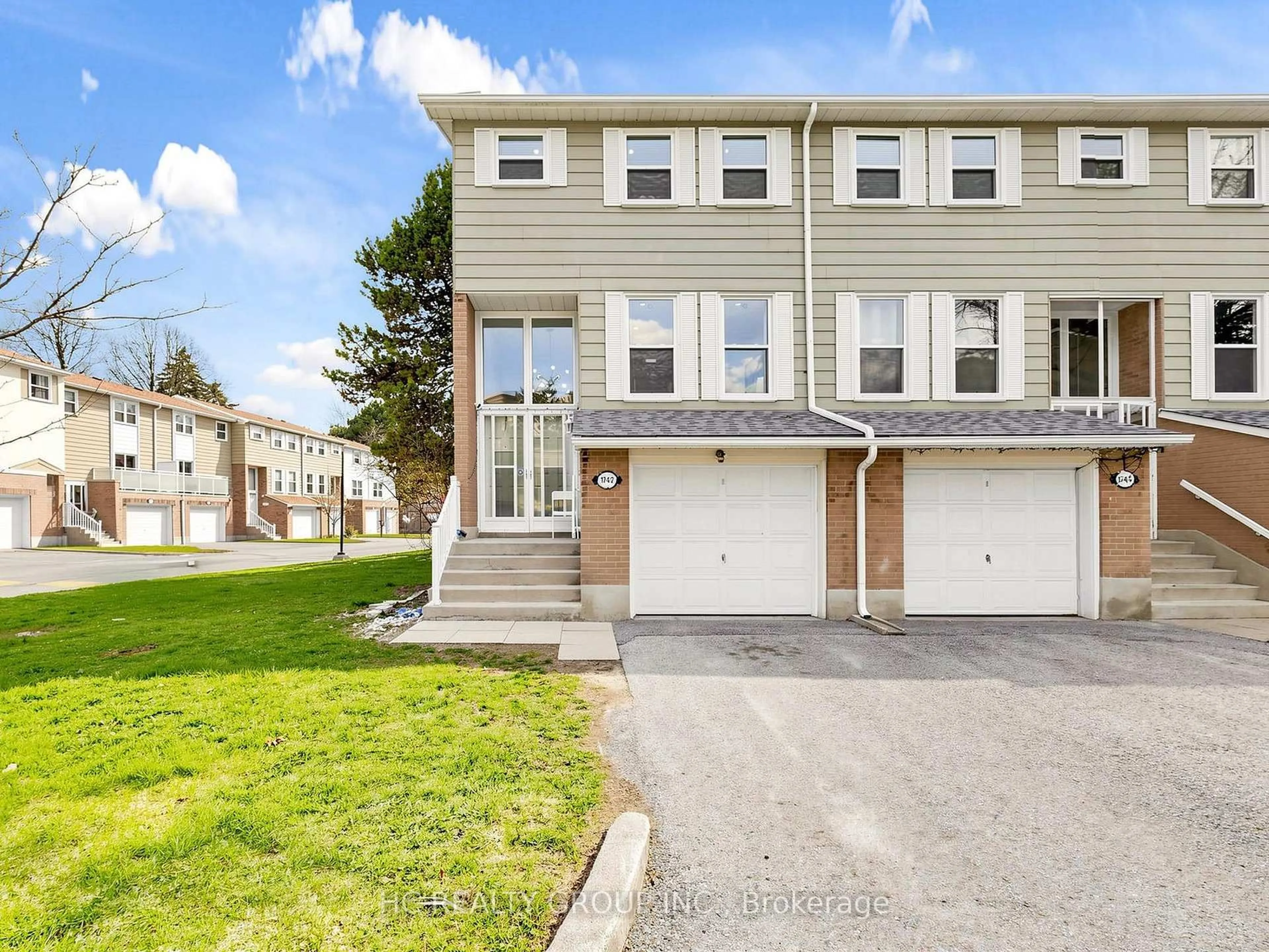 Home with vinyl exterior material, street for 1742 John St #36, Markham Ontario L3T 1Y9