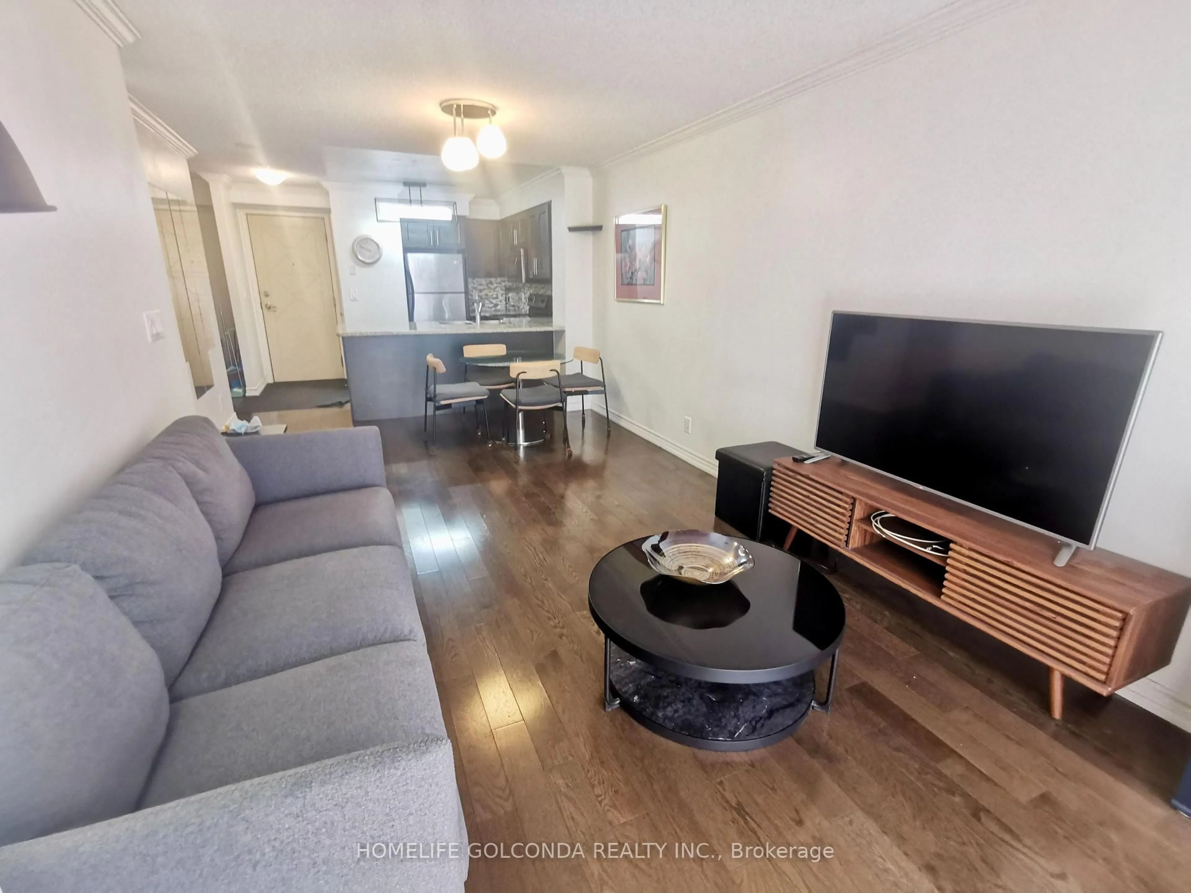 Living room with furniture, wood/laminate floor for 18 Harding Blvd #412, Richmond Hill Ontario L4C 0T3