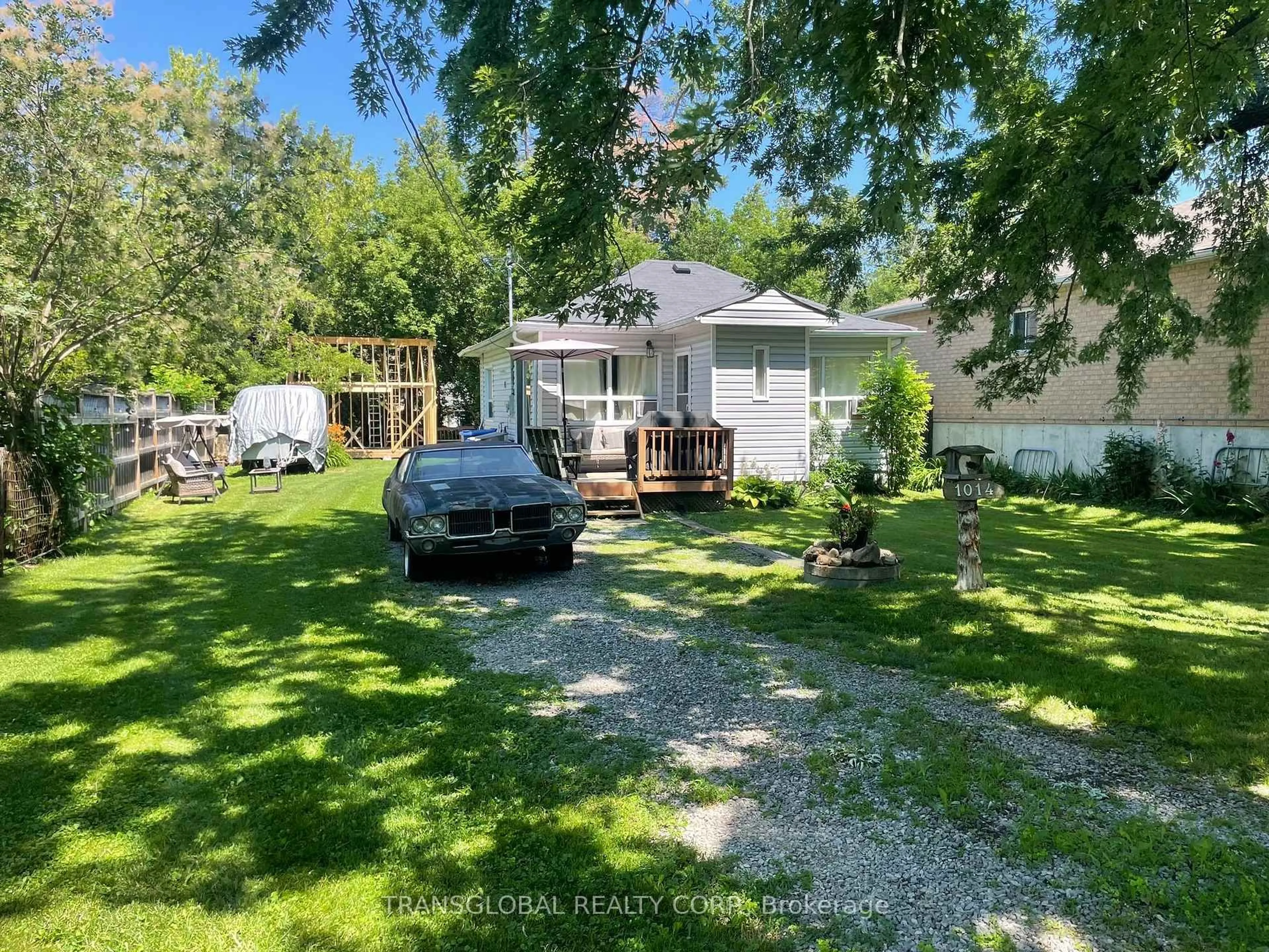 A pic from outside/outdoor area/front of a property/back of a property/a pic from drone, water/lake/river/ocean view for 1014 Barton Ave, Georgina Ontario L4P 3E9