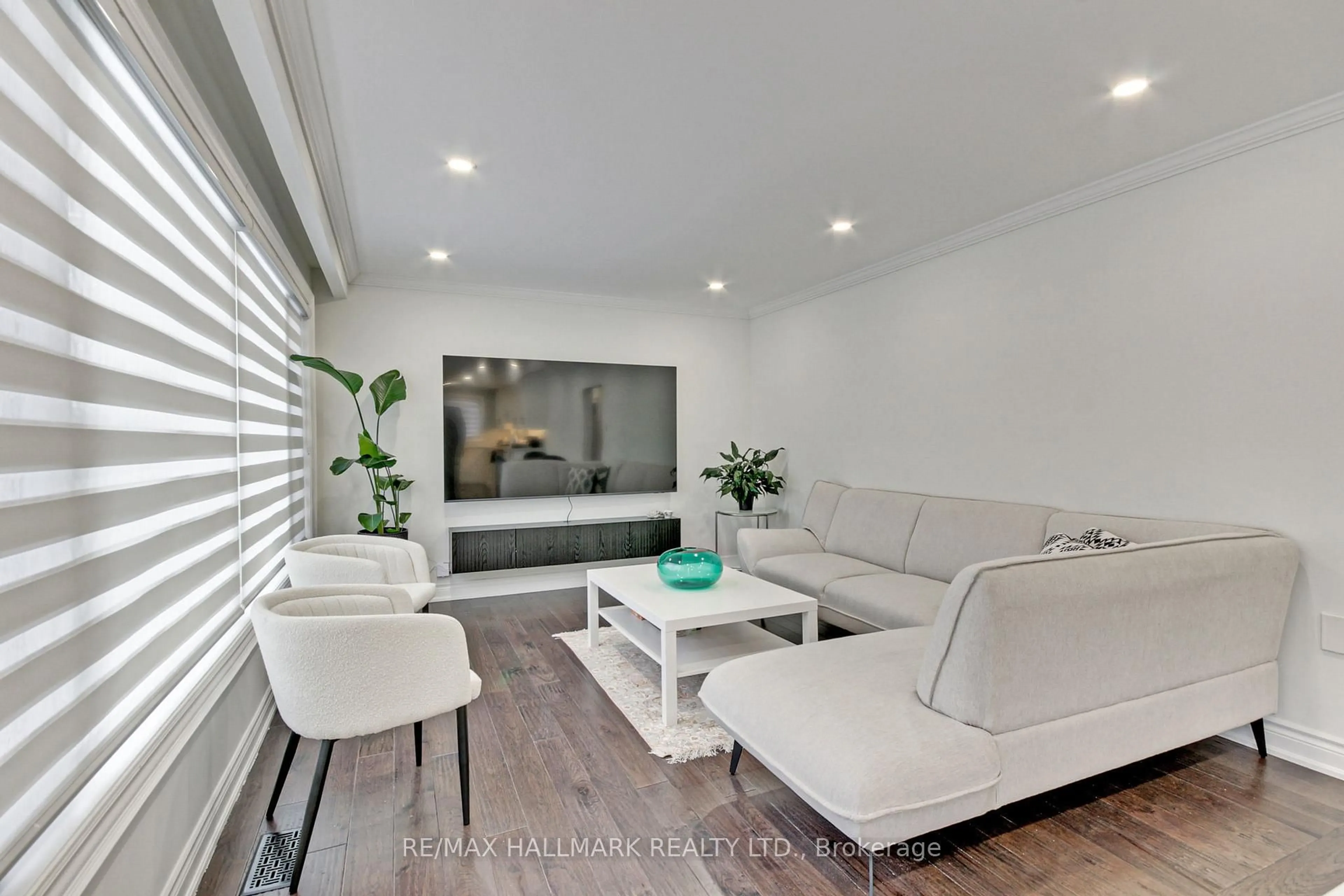 Living room with furniture, wood/laminate floor for 13 Patrick Dr, Aurora Ontario L4G 2A6