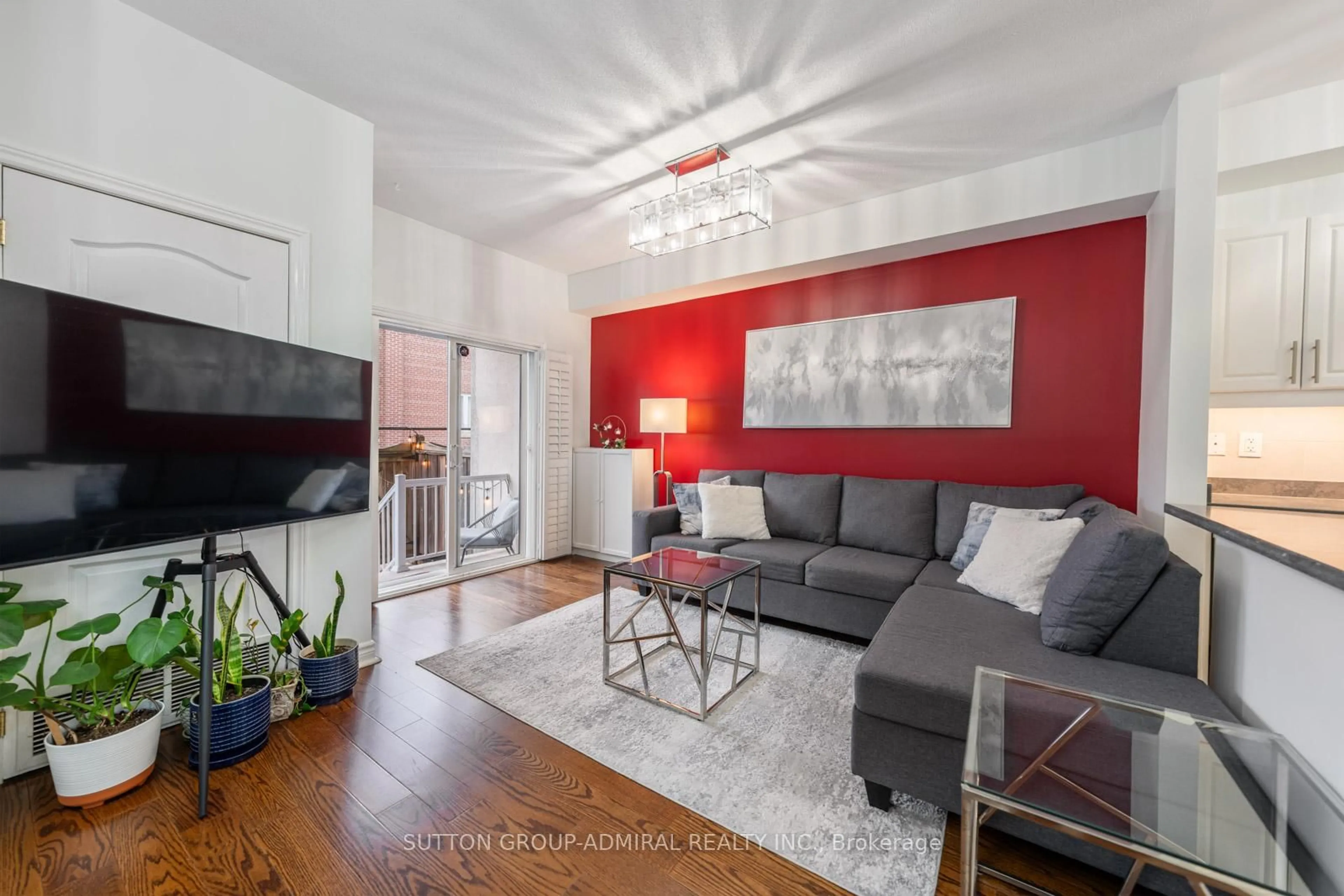 Living room with furniture, wood/laminate floor for 9944 Keele St #102, Vaughan Ontario L6A 3Z4