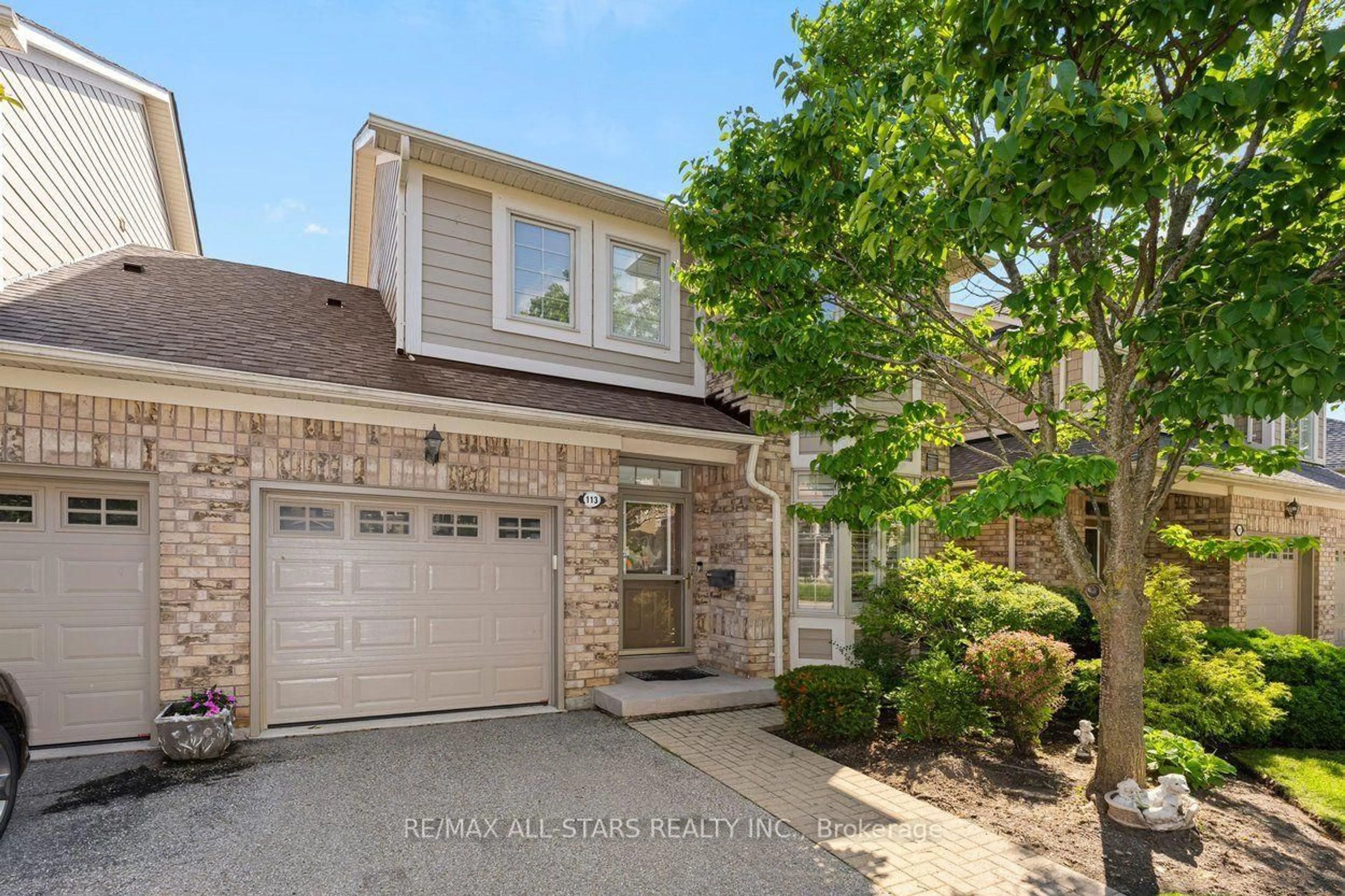 Home with brick exterior material, street for 113 Louisbourg Way, Markham Ontario L6E 2A2