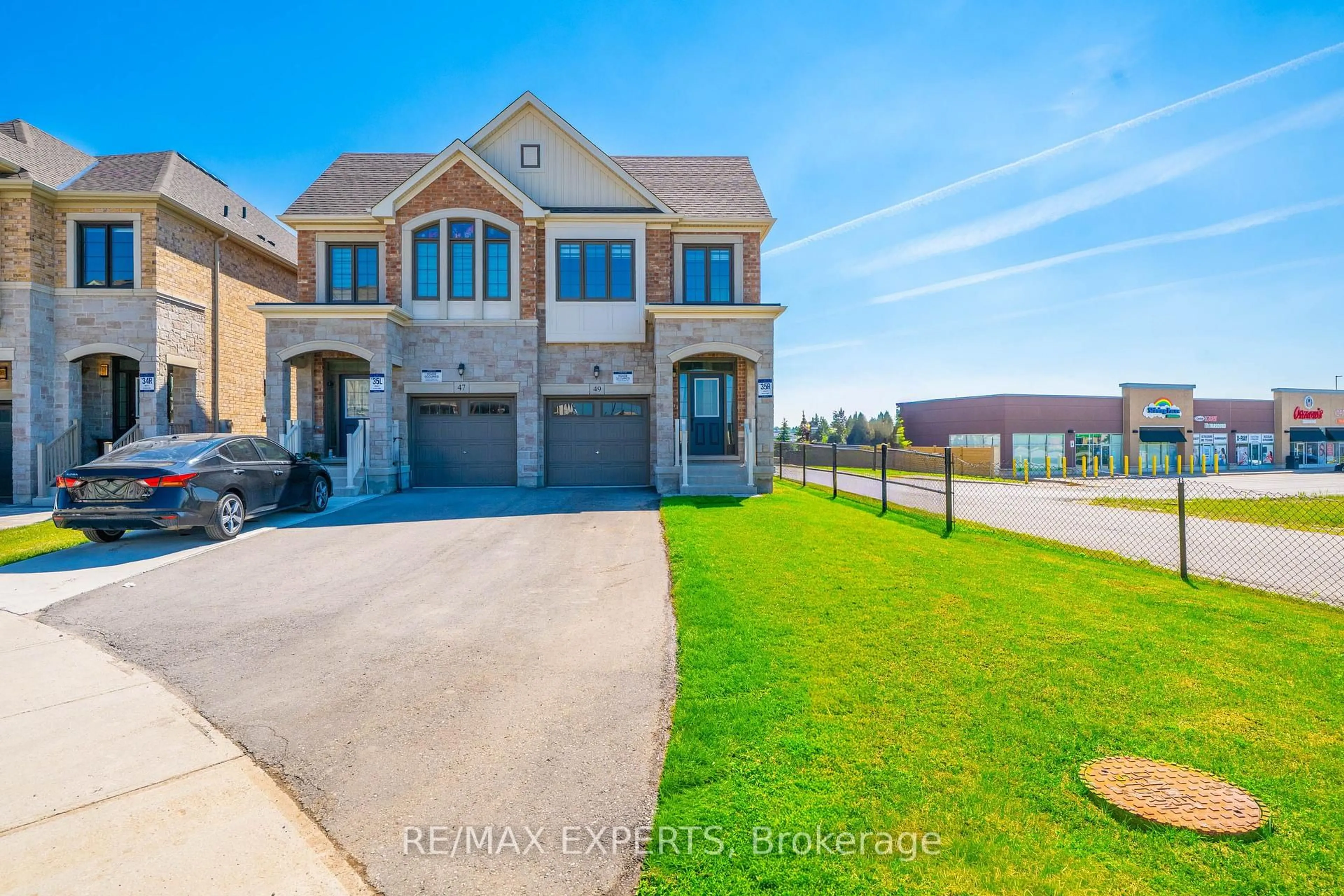 A pic from outside/outdoor area/front of a property/back of a property/a pic from drone, water/lake/river/ocean view for 49 Paisley Dr, Bradford West Gwillimbury Ontario L3Z 4P2