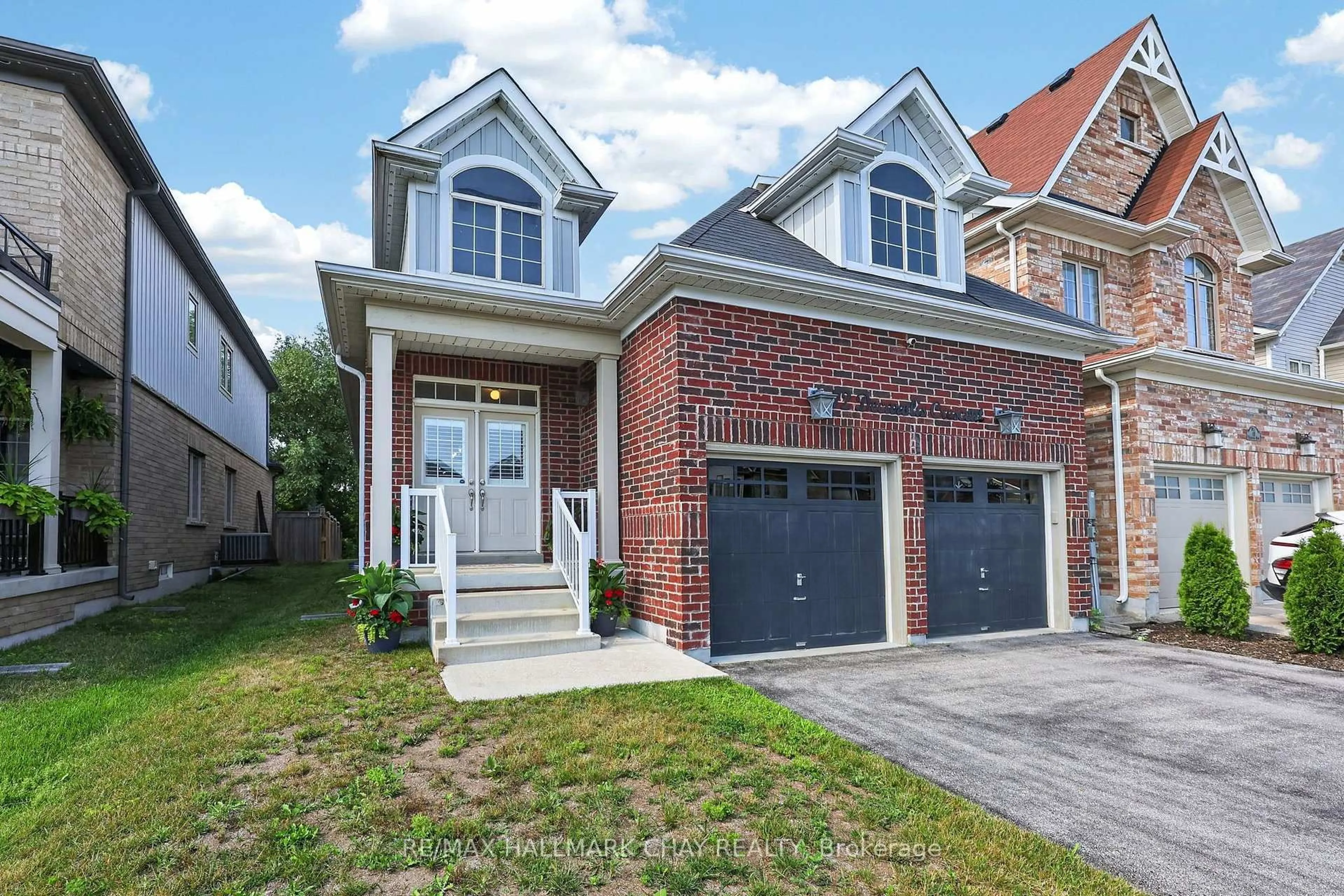 Home with brick exterior material, street for 72 Decarolis Cres, Essa Ontario L3W 0B2