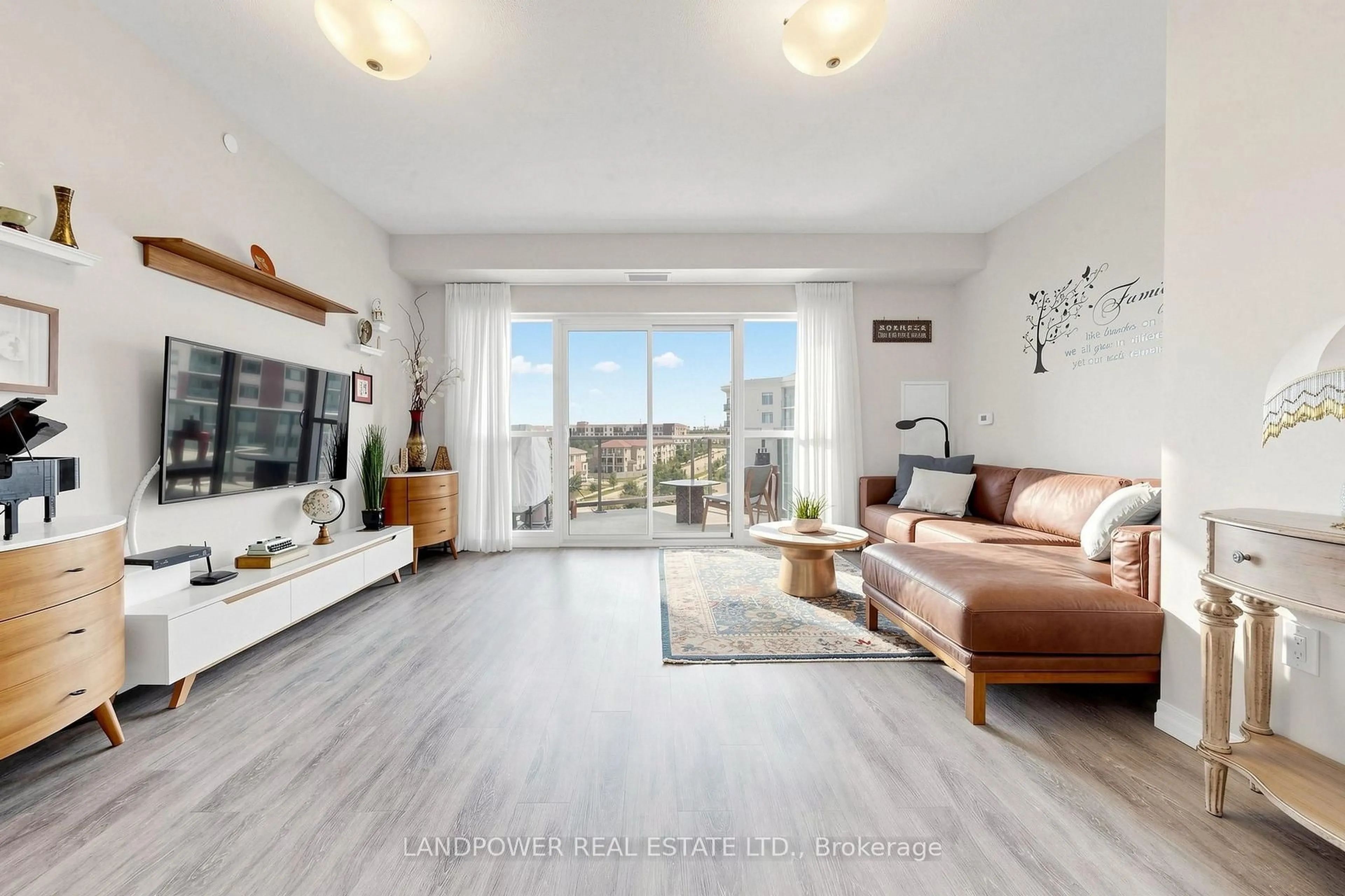 Living room with furniture, wood/laminate floor for 440 William Graham Dr #503, Aurora Ontario L4G 1X5