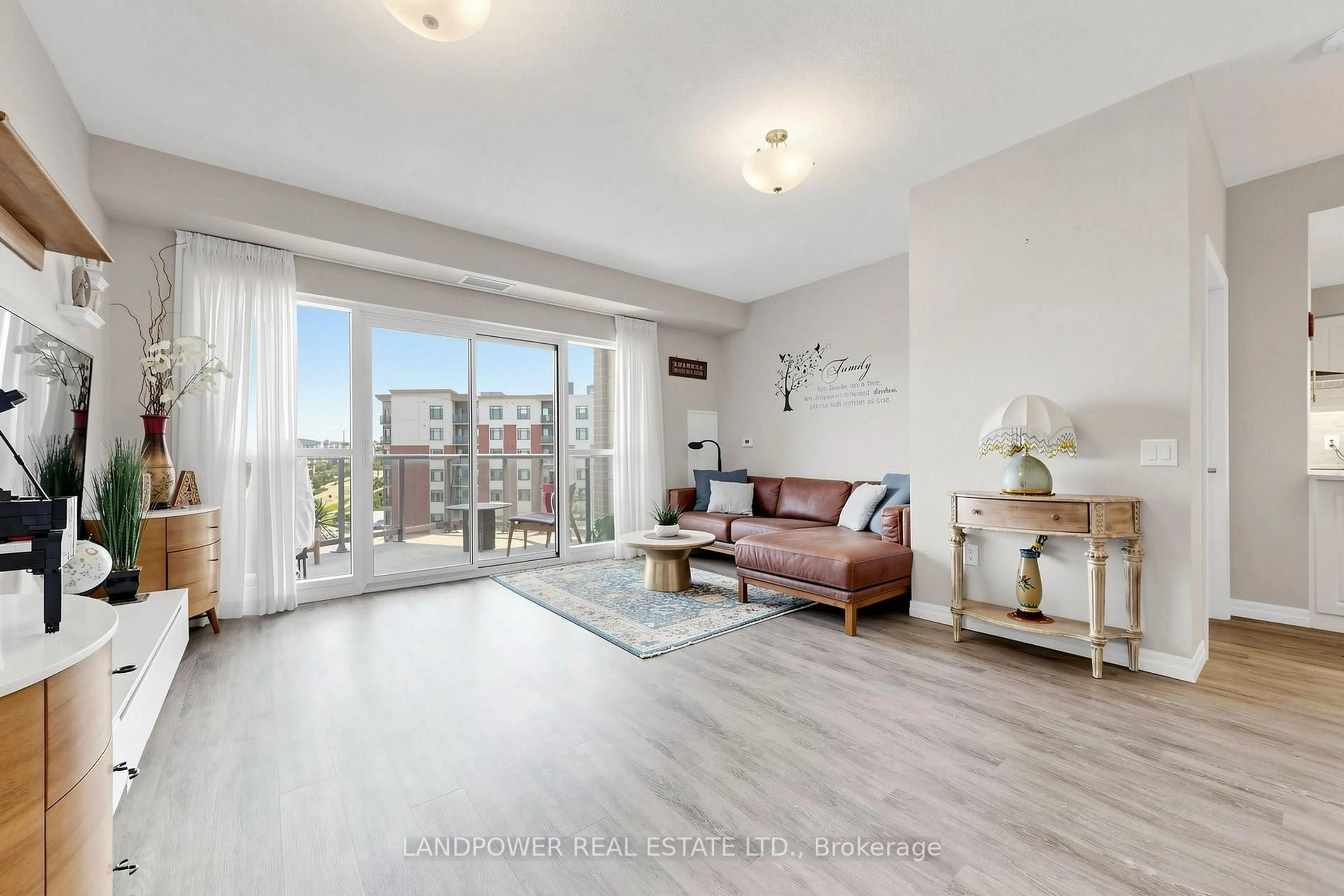 Living room with furniture, wood/laminate floor for 440 William Graham Dr #503, Aurora Ontario L4G 1X5