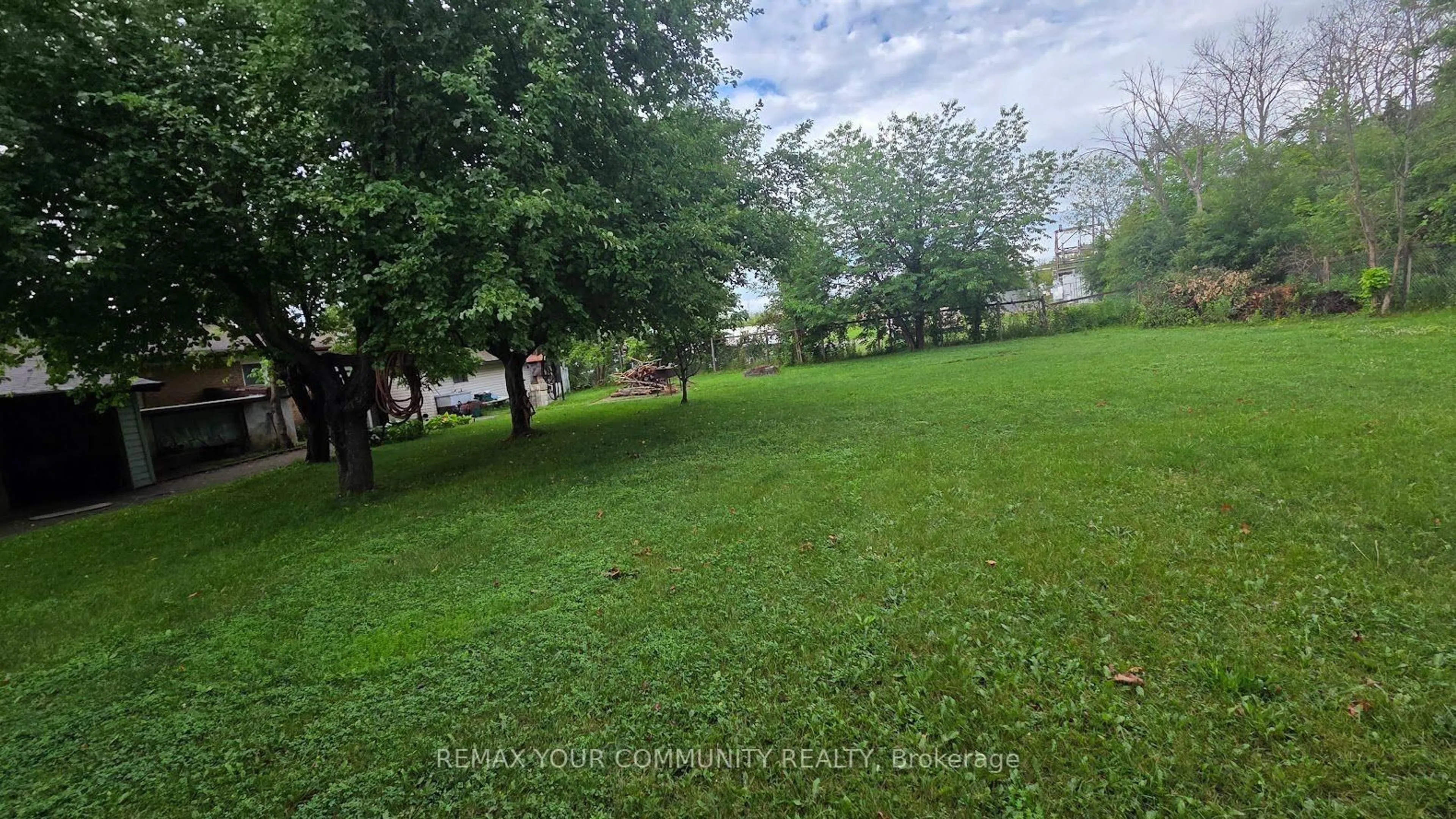 A pic from outside/outdoor area/front of a property/back of a property/a pic from drone, water/lake/river/ocean view for 1031 Metro Rd, Georgina Ontario L4P 3E9
