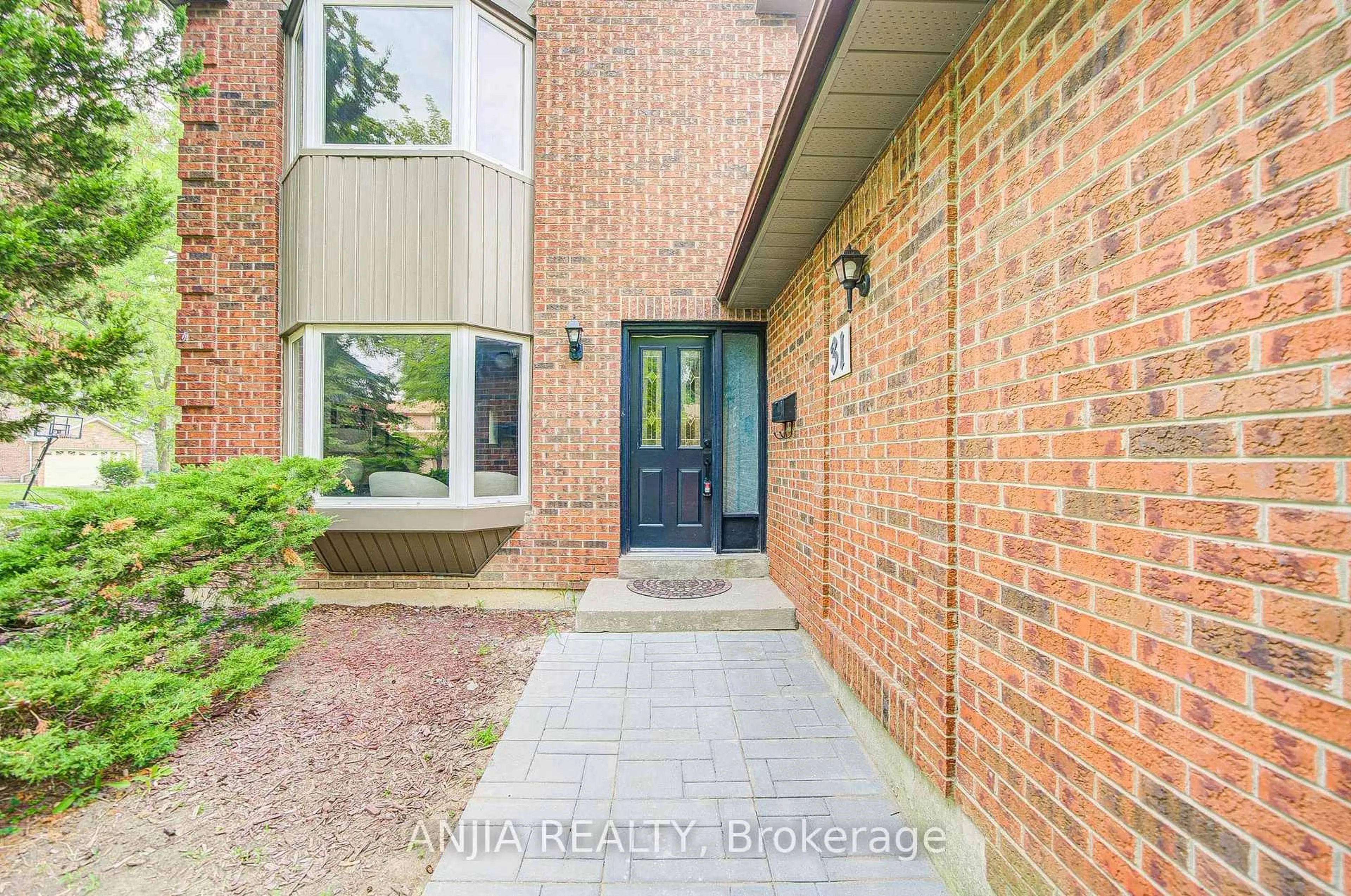 Home with brick exterior material, street for 31 Spanhouse Cres, Markham Ontario L3R 4E2