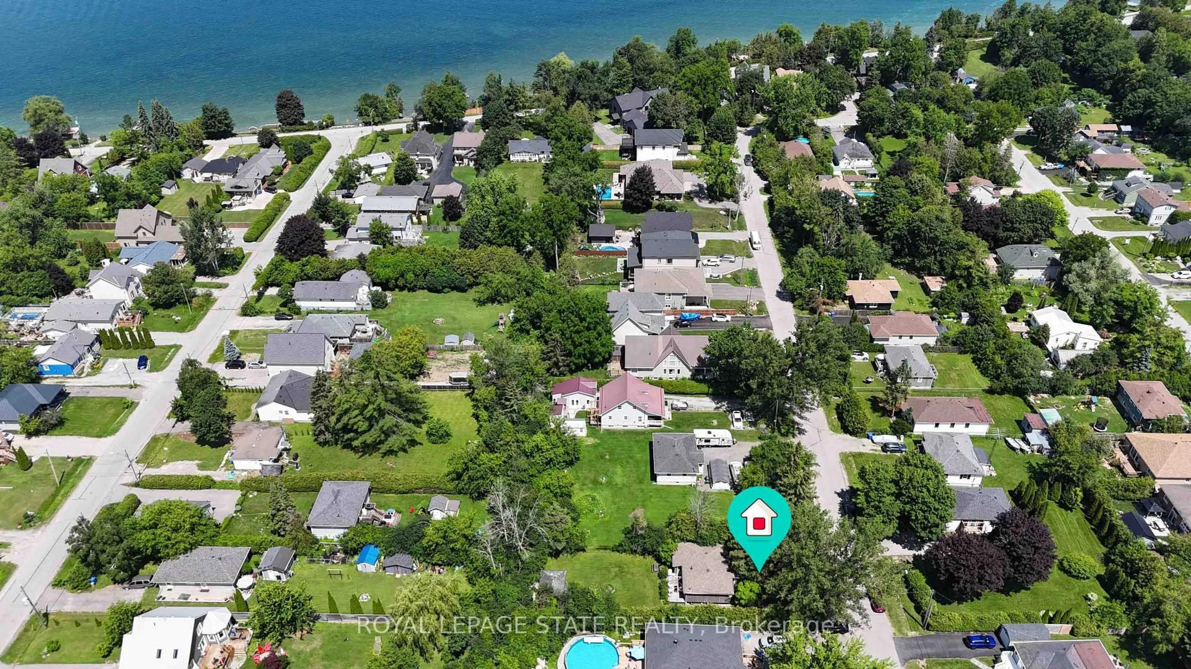 A pic from outside/outdoor area/front of a property/back of a property/a pic from drone, water/lake/river/ocean view for 104 Farley Circ, Georgina Ontario L0E 1S0