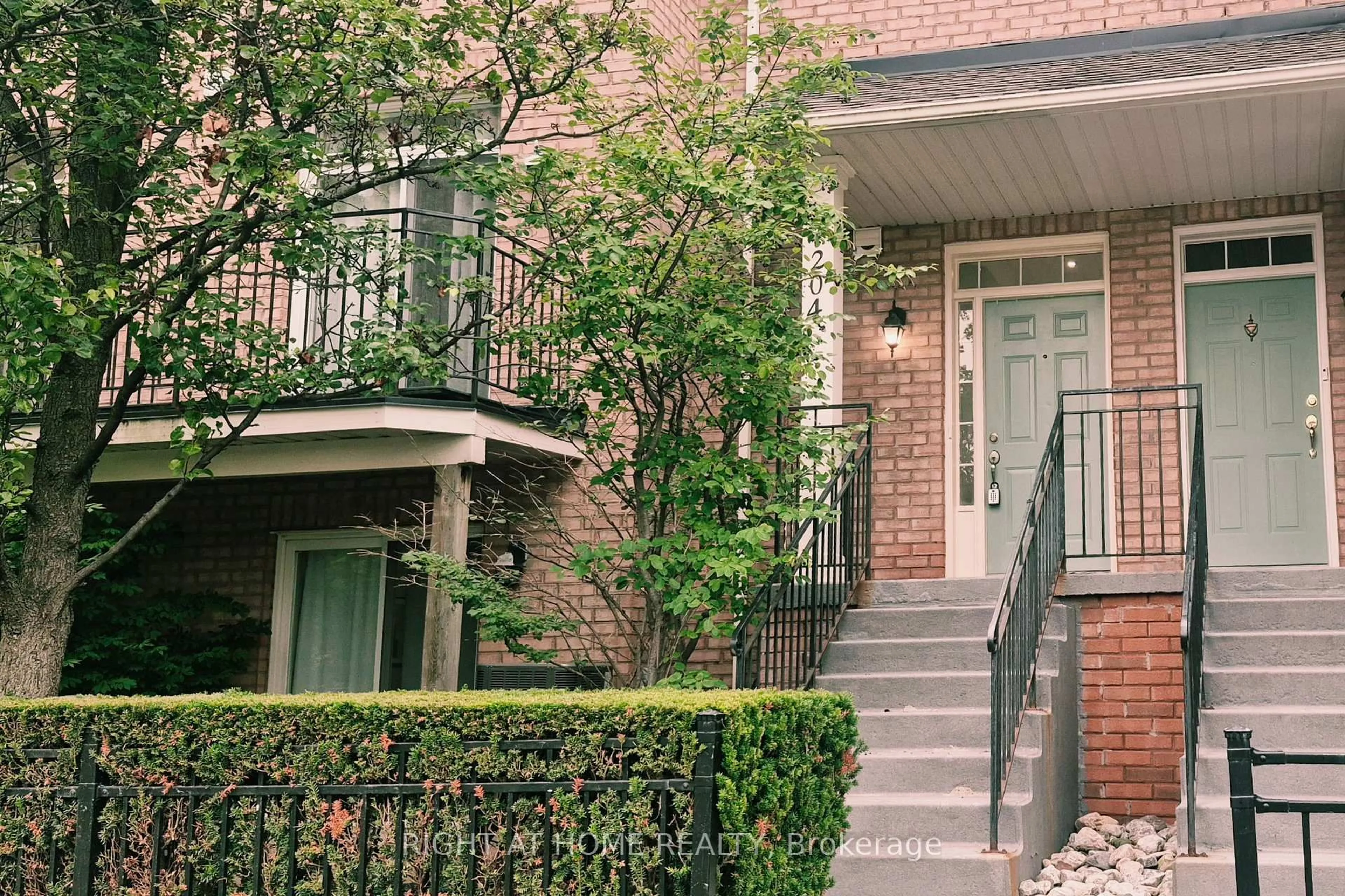Home with brick exterior material, street for 23 Observatory Lane #204, Richmond Hill Ontario L4C 0M7