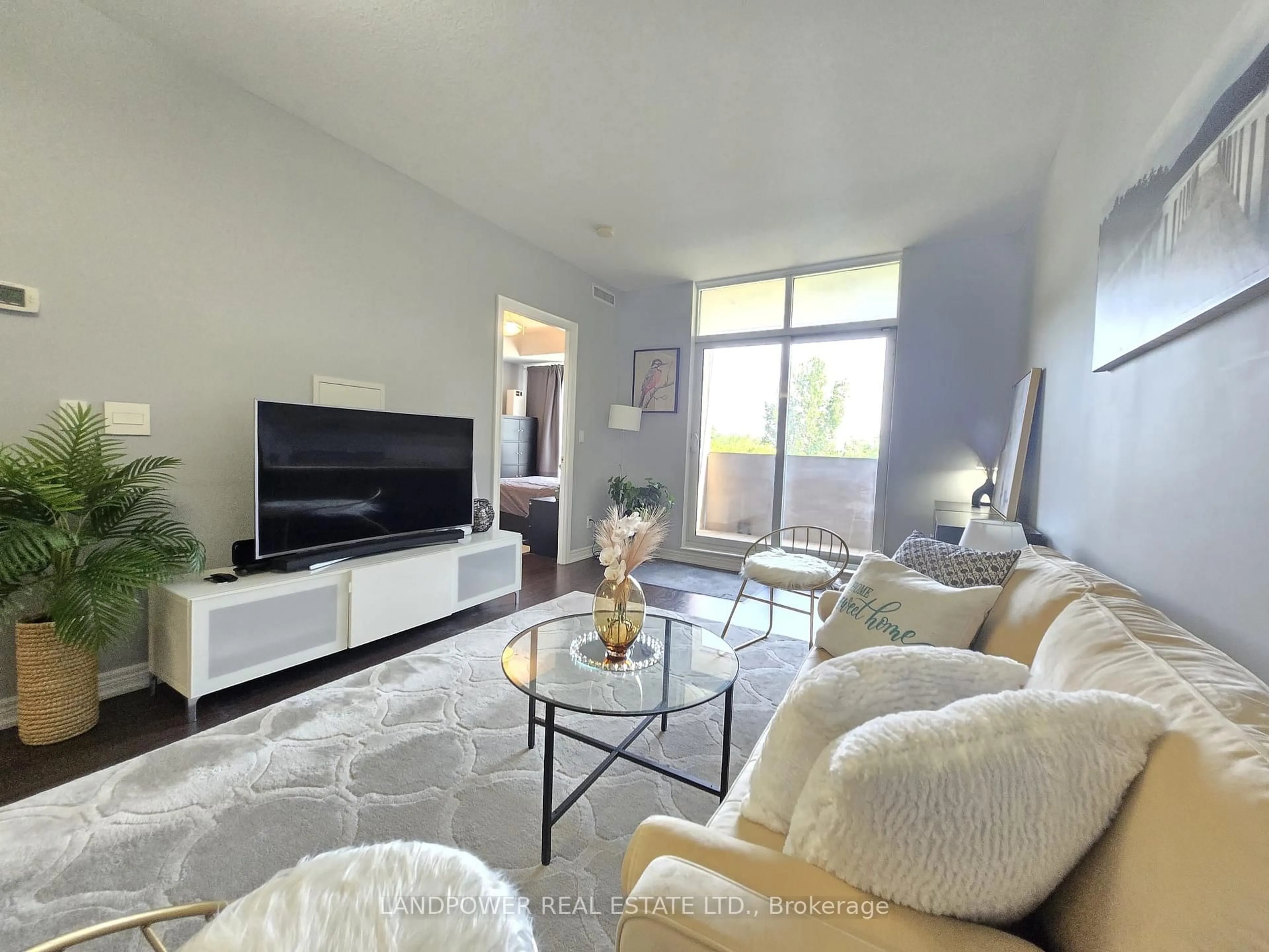 Living room with furniture, unknown for 9245 Jane St #208, Vaughan Ontario L6A 0J9