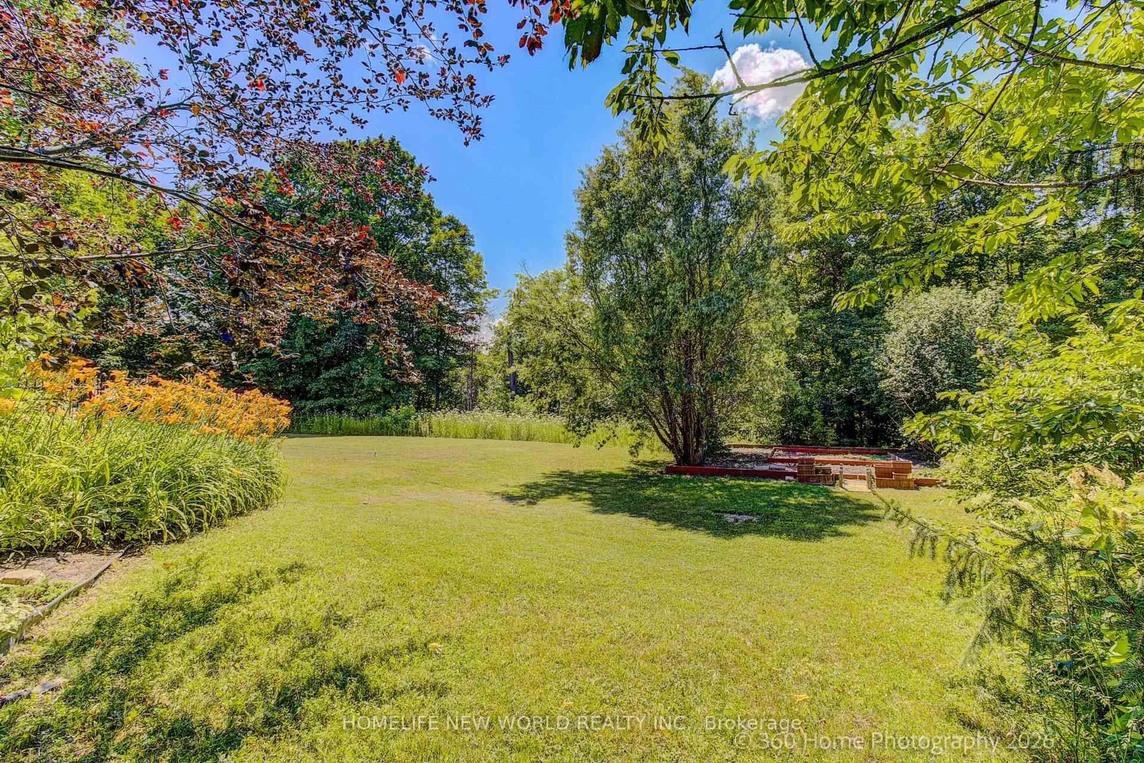 A pic from outside/outdoor area/front of a property/back of a property/a pic from drone, forest/trees view for 212 Burns Blvd, King Ontario L7B 1C8