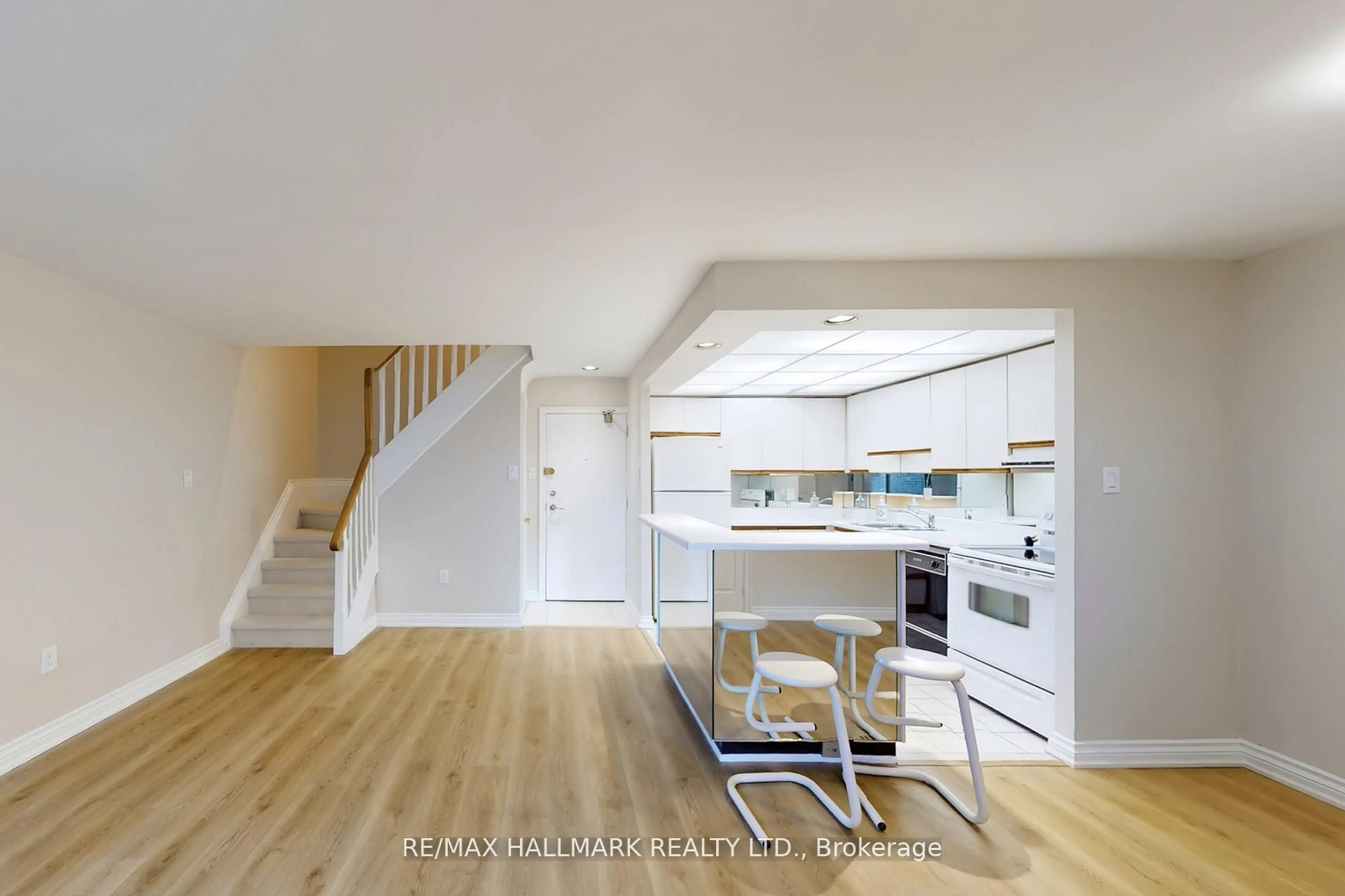 Open concept kitchen, wood/laminate floor for 16 Elgin St #316, Markham Ontario L3T 4T4