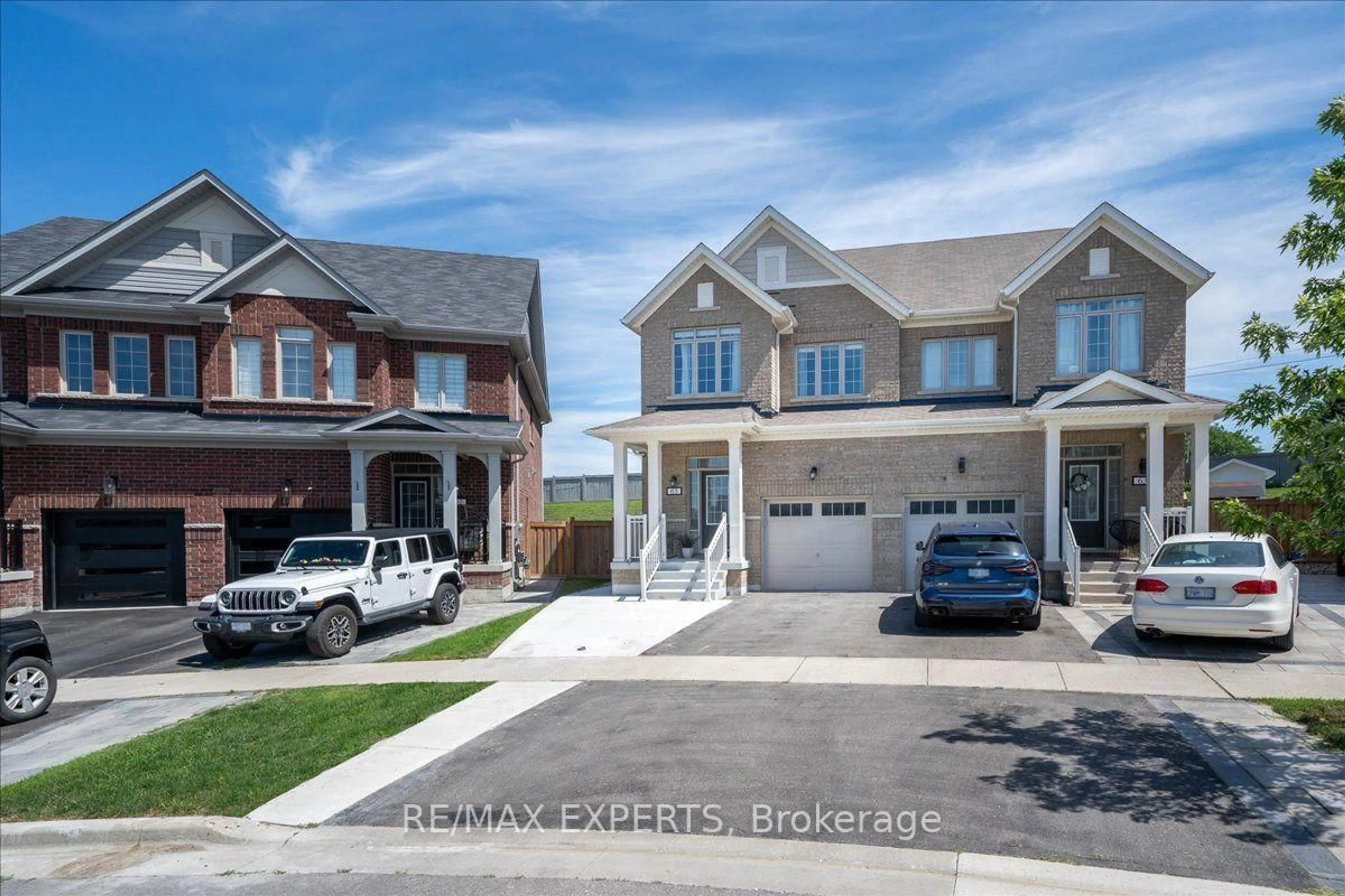 A pic from outside/outdoor area/front of a property/back of a property/a pic from drone, street for 65 Casserley Cres, New Tecumseth Ontario L0G 1W0