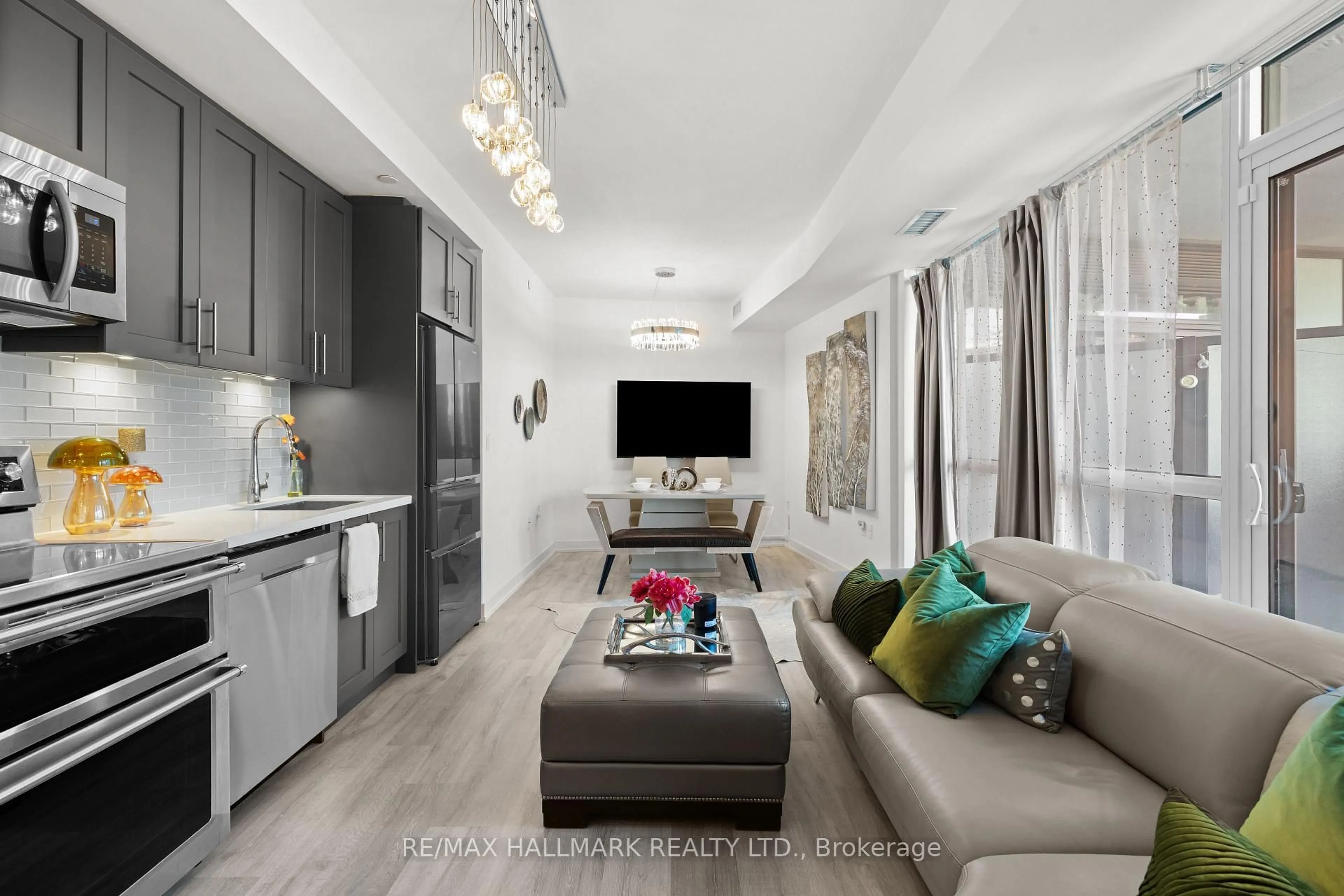 Living room with furniture, ceramic/tile floor for 375 Sea Ray Ave #225, Innisfil Ontario L9S 0L9