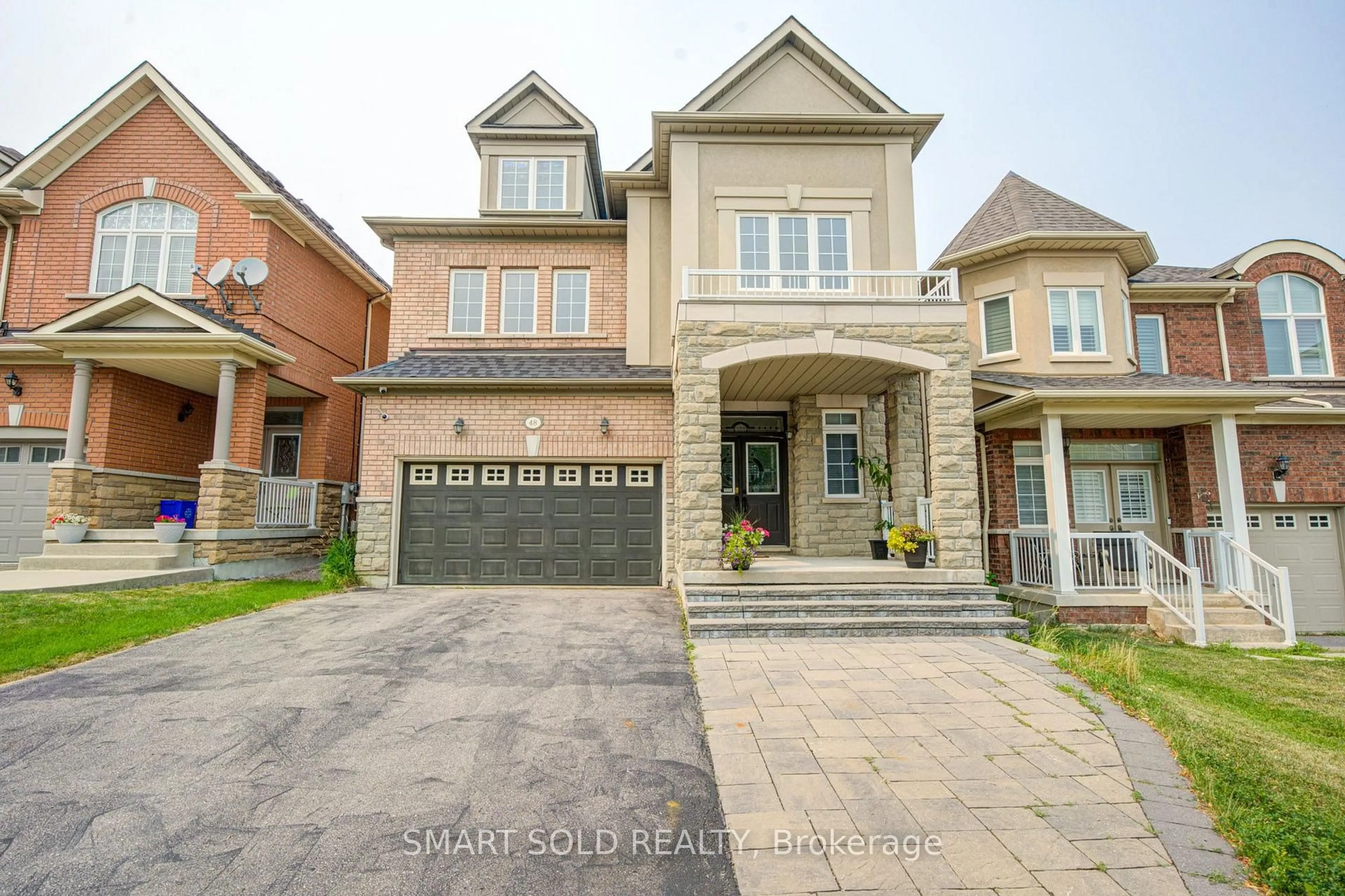 Home with brick exterior material, street for 48 Ravel Dr, Vaughan Ontario L4J 8Z2