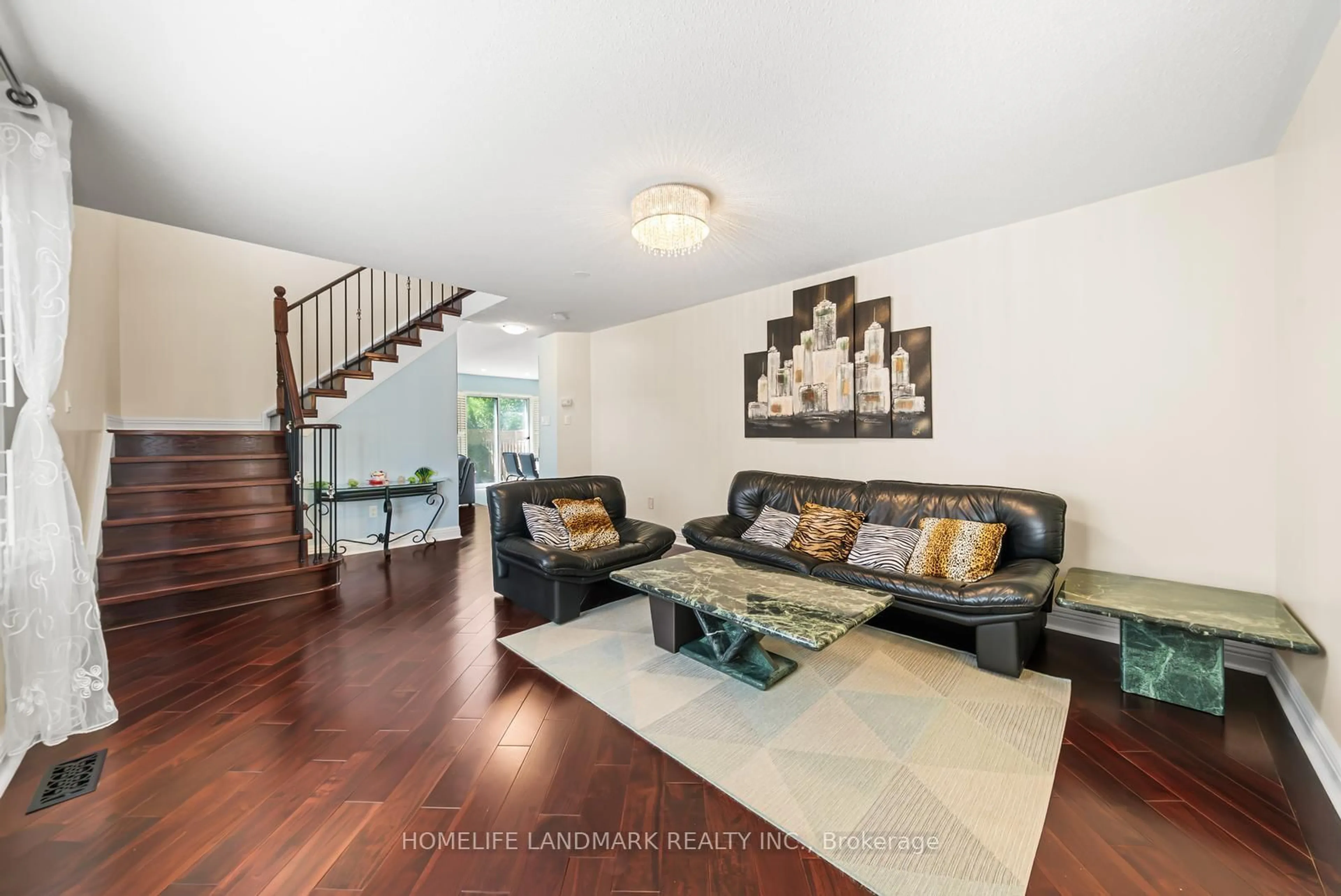 Living room with furniture, wood/laminate floor for 75 Bassett Ave, Richmond Hill Ontario L4B 4J9