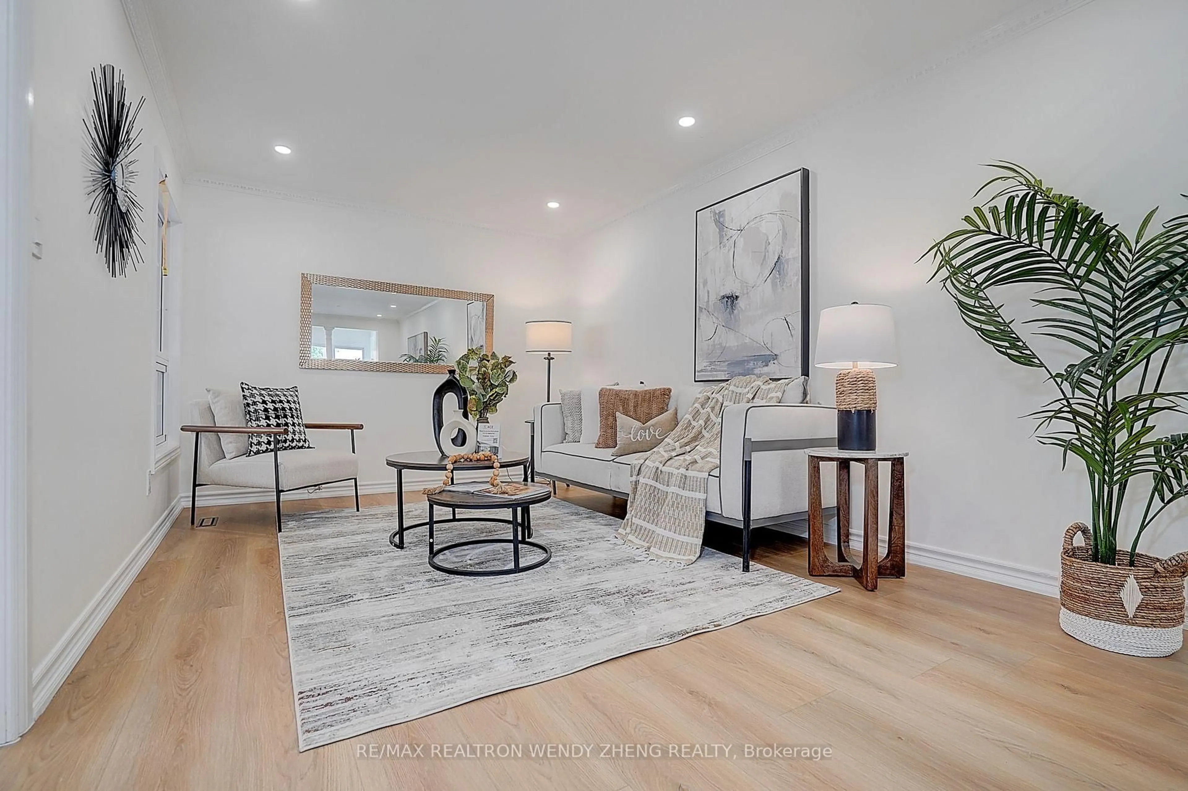 Living room with furniture, wood/laminate floor for 36 Chloe Cres, Markham Ontario L3S 2H5