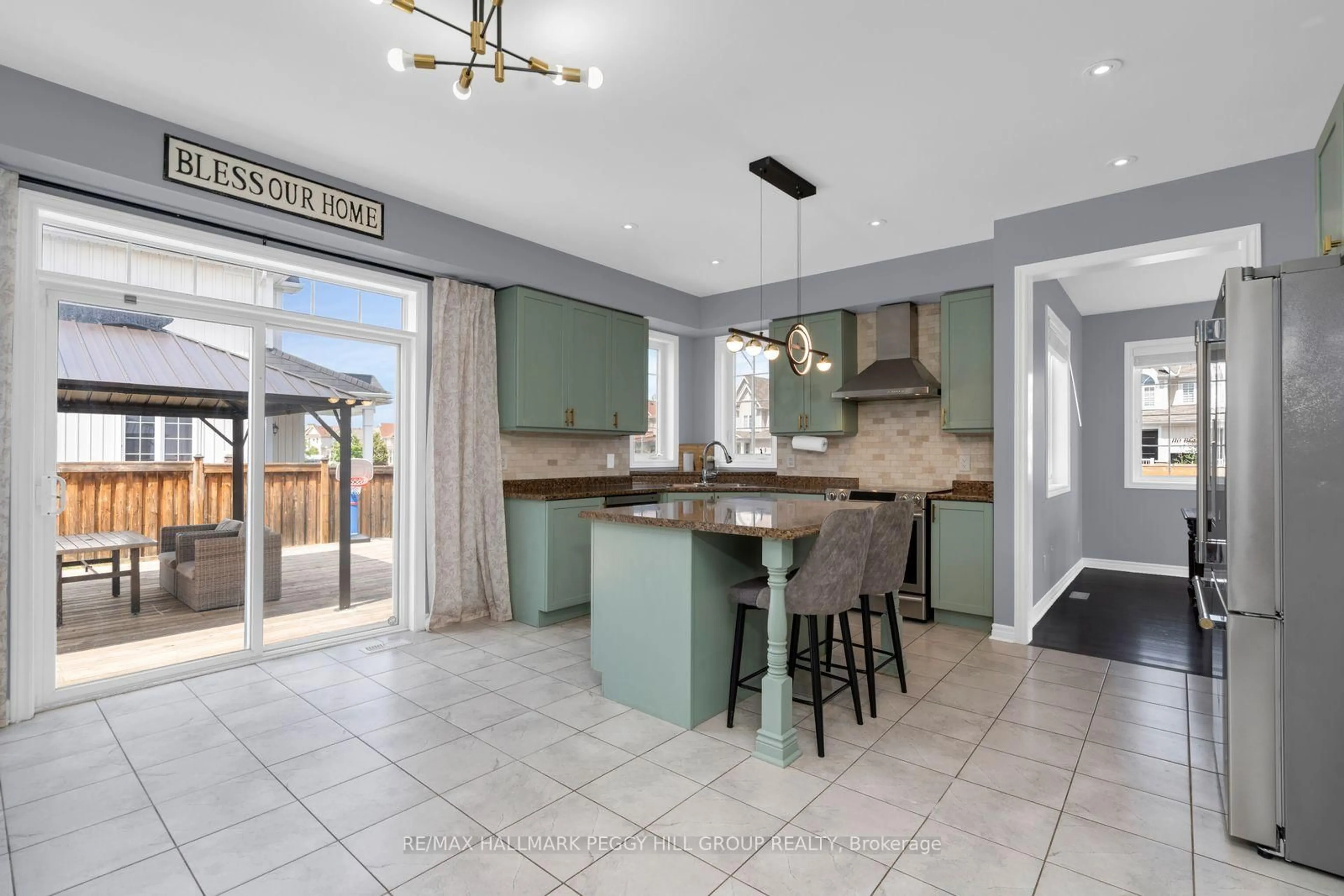 Open concept kitchen, ceramic/tile floor for 124 Latimer Ave, Essa Ontario L3W 0M9