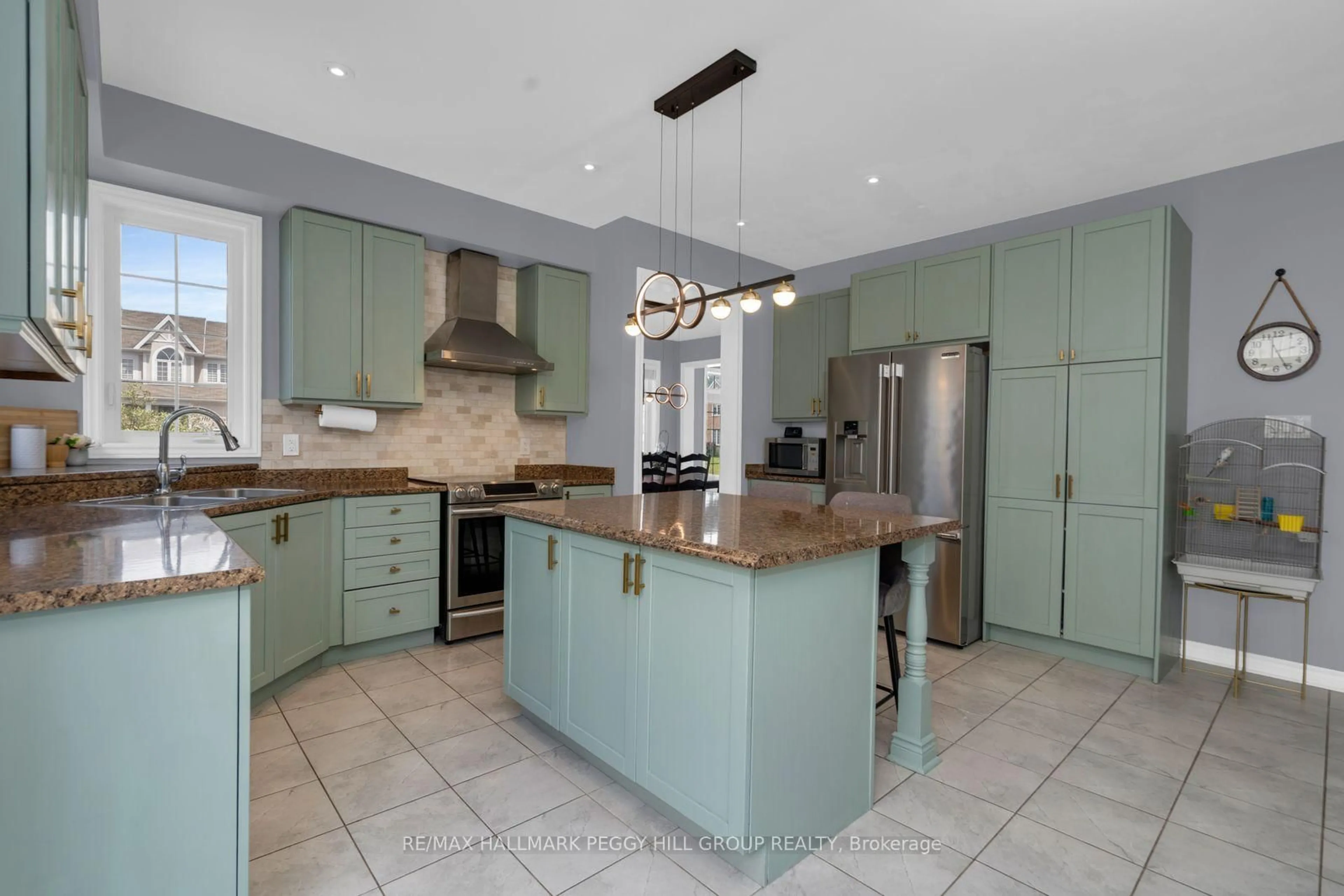Open concept kitchen, ceramic/tile floor for 124 Latimer Ave, Essa Ontario L3W 0M9