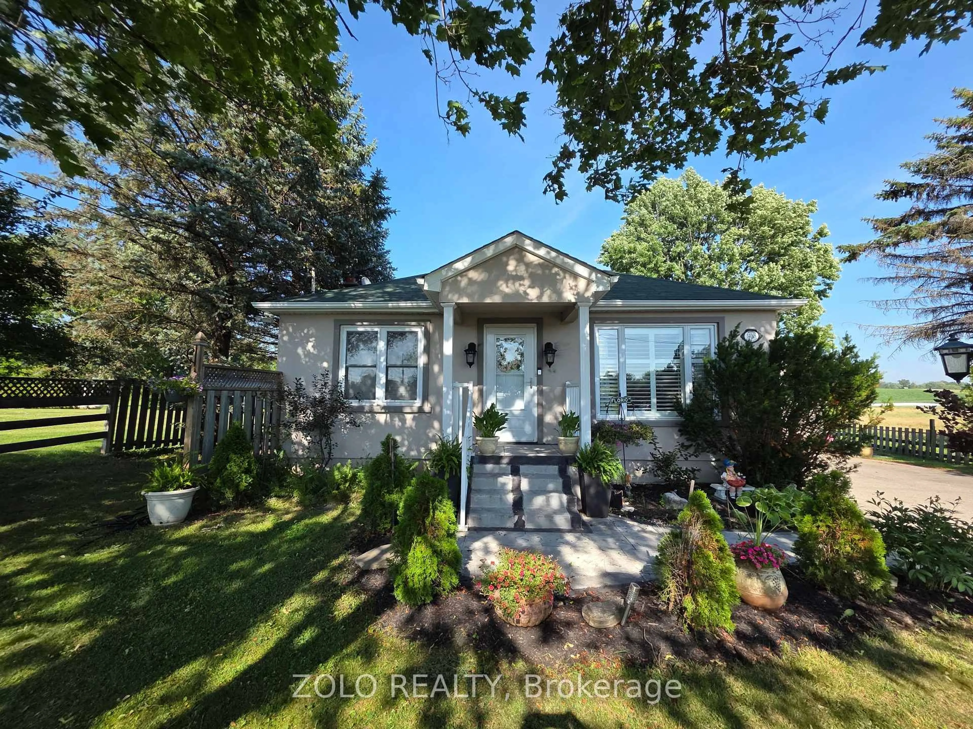 Home with vinyl exterior material, street for 14065 Highway 27, King Ontario L0G 1T0