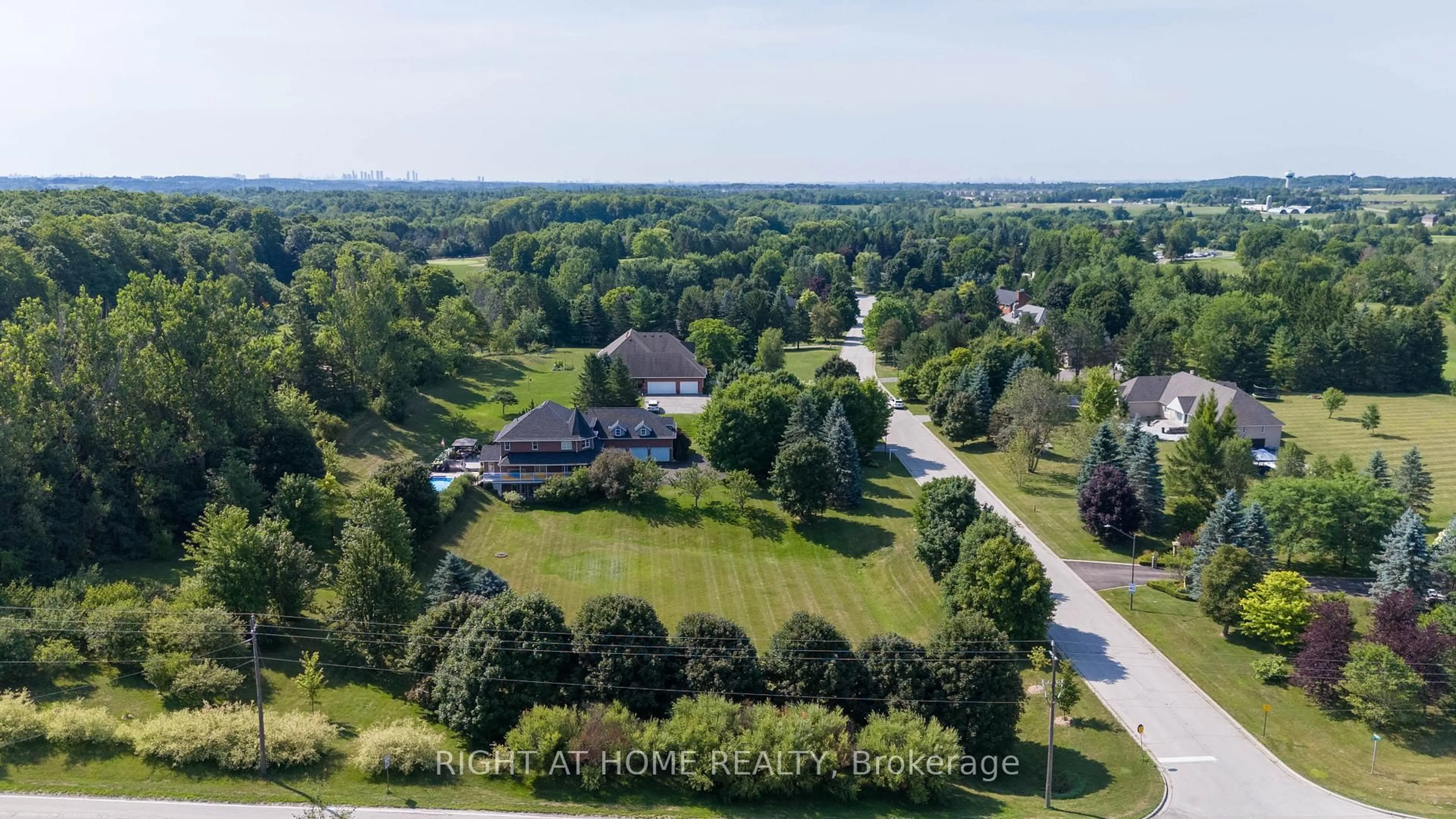 A pic from outside/outdoor area/front of a property/back of a property/a pic from drone, water/lake/river/ocean view for 11 Trainor Crt, King Ontario L0G 1N0