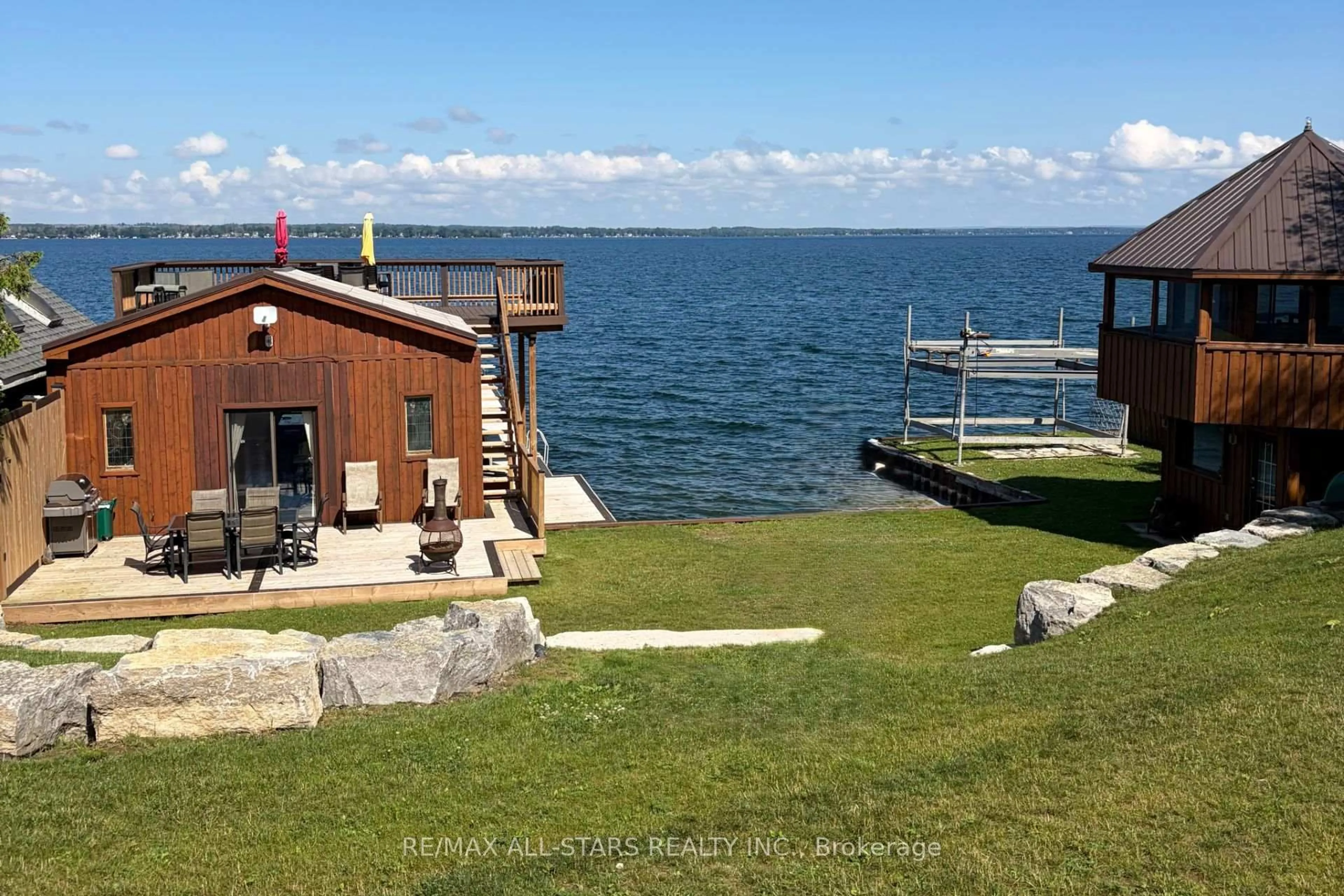 A pic from outside/outdoor area/front of a property/back of a property/a pic from drone, water/lake/river/ocean view for 664 Lake Dr, Georgina Ontario L0E 1P0