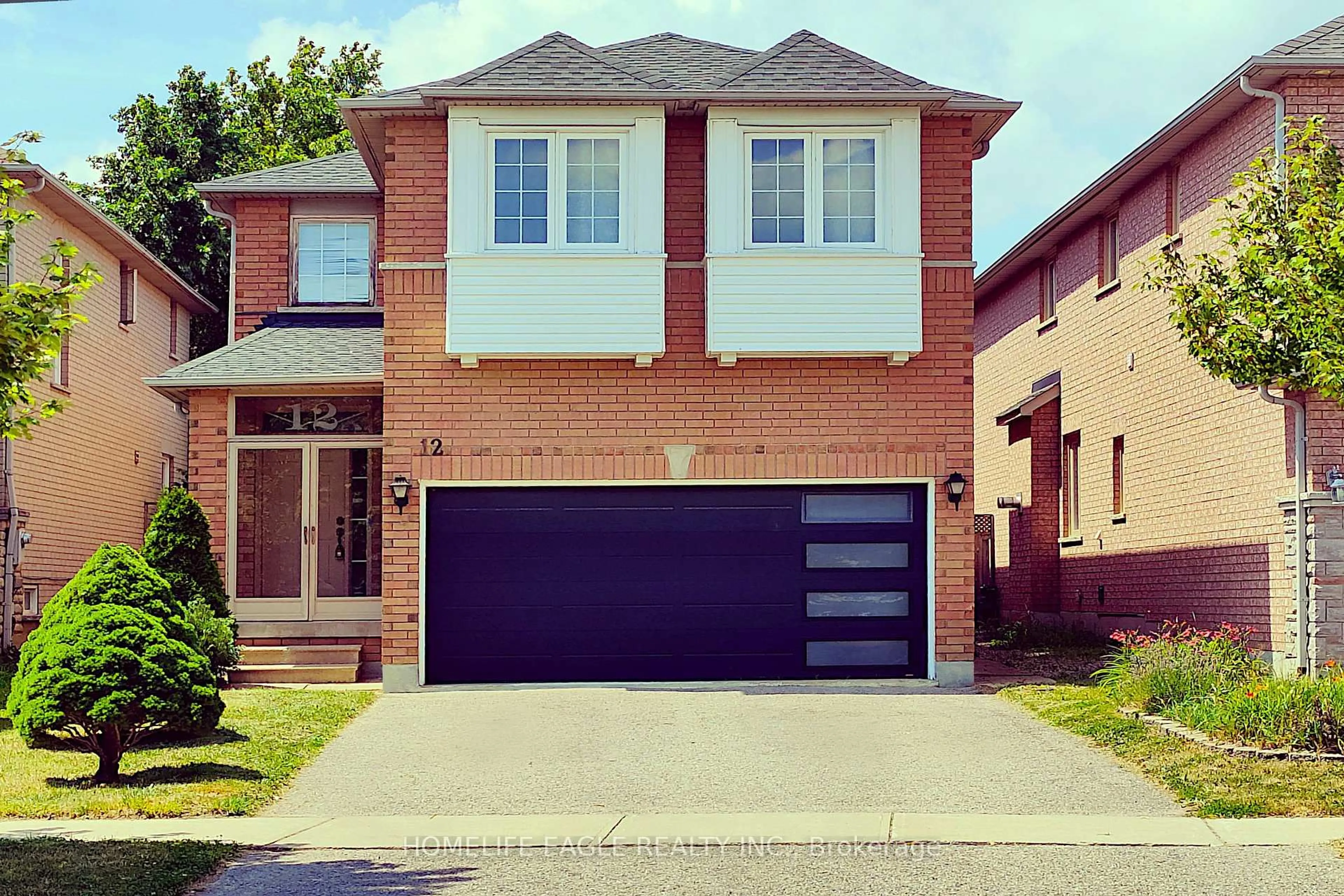 Home with brick exterior material, street for 12 Indigo St, Richmond Hill Ontario L4S 1W2