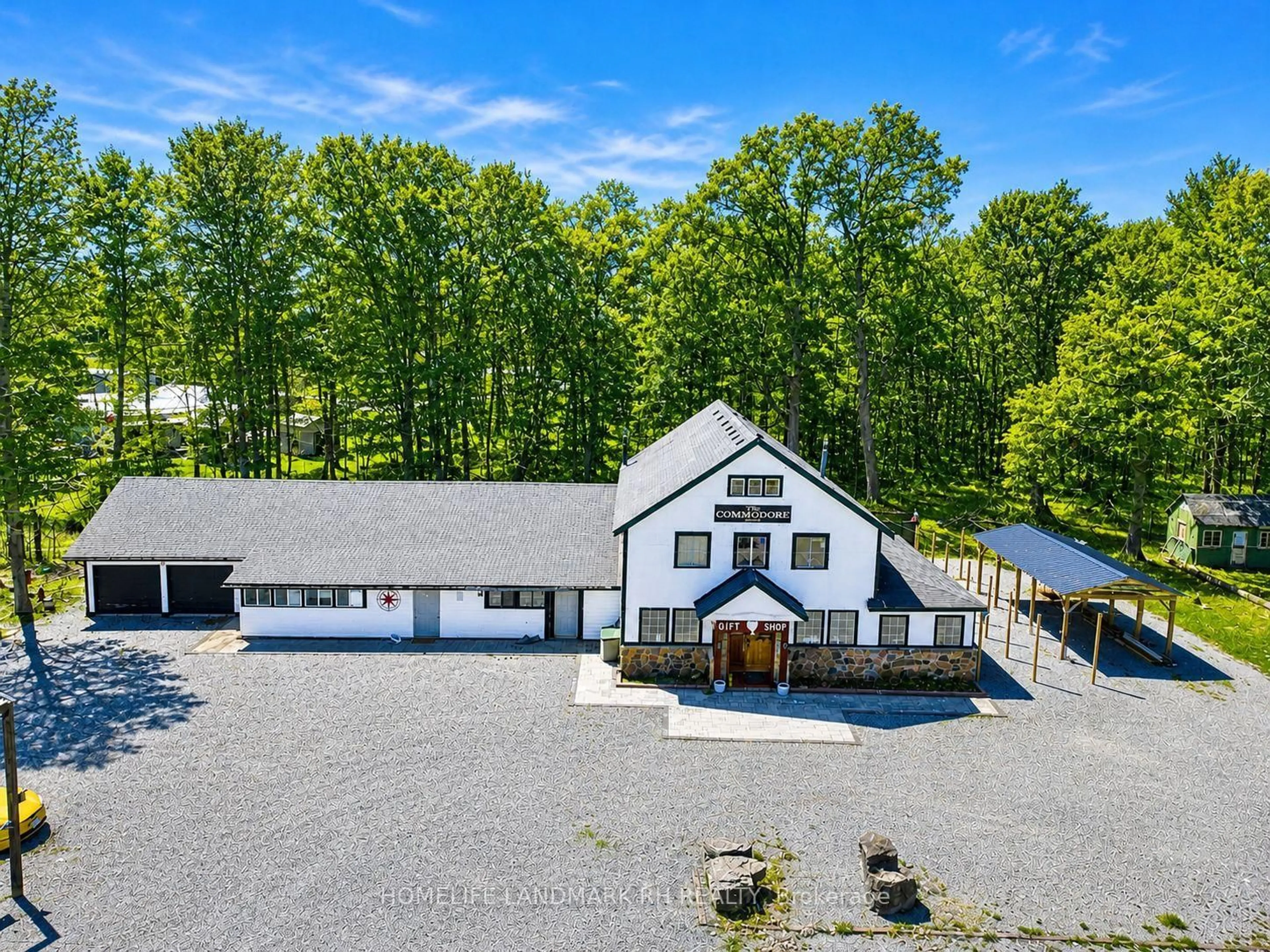 A pic from outside/outdoor area/front of a property/back of a property/a pic from drone, unknown for 25066 Commodore Rd, Brock Ontario L0K 1A0