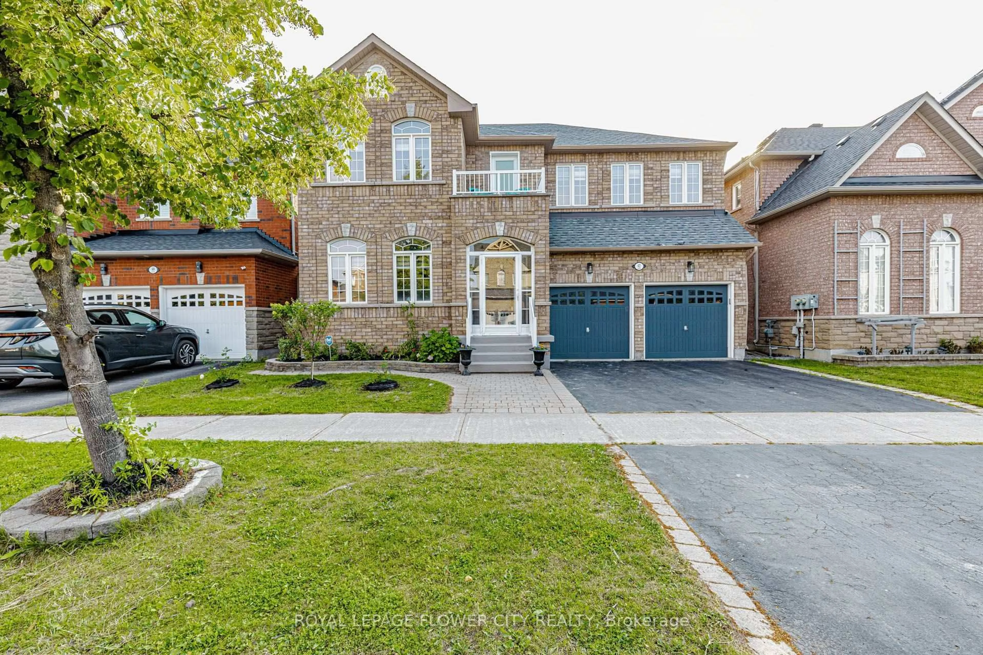 Home with brick exterior material, street for 42 Delray Dr, Markham Ontario L6E 1Y6