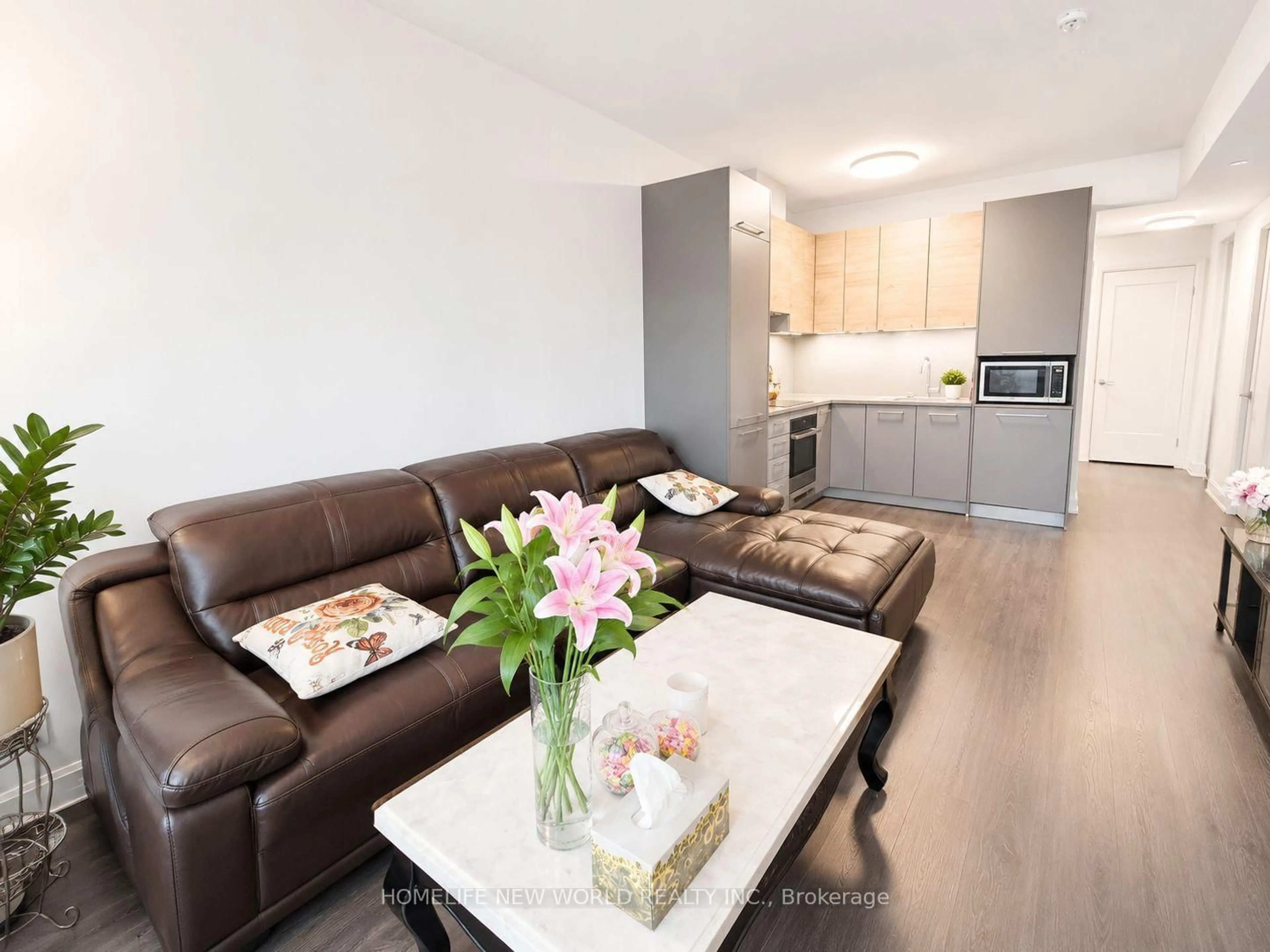 Living room with furniture, wood/laminate floor for 12 Gandhi Lane #1208, Markham Ontario L3T 0G8