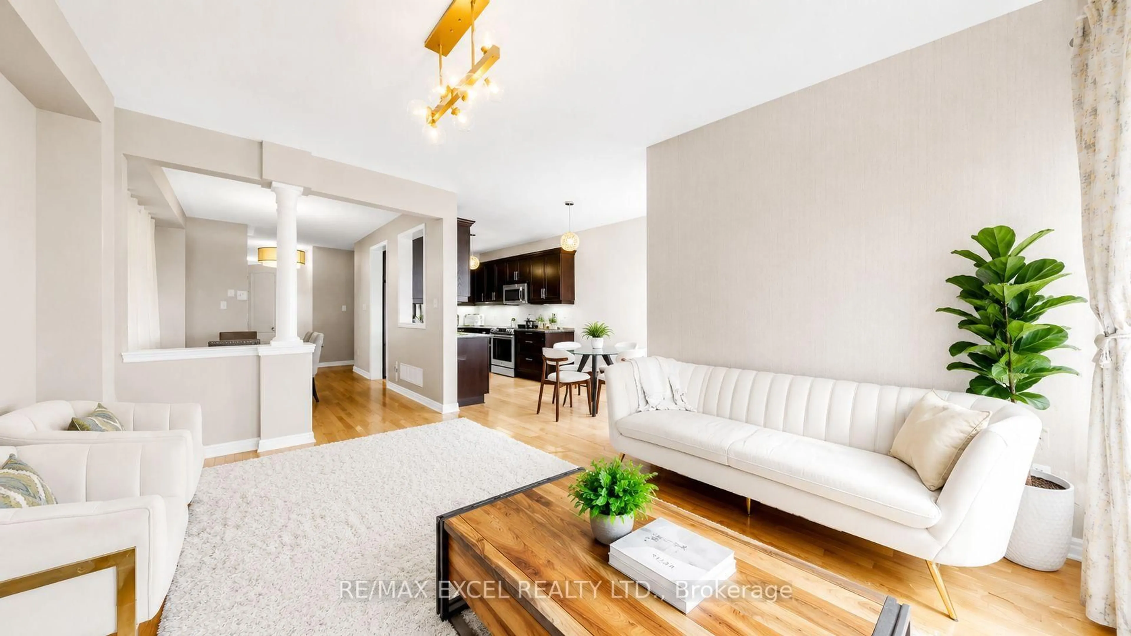 Living room with furniture, wood/laminate floor for 176 Sir Sanford Fleming Way, Vaughan Ontario L6A 0V4