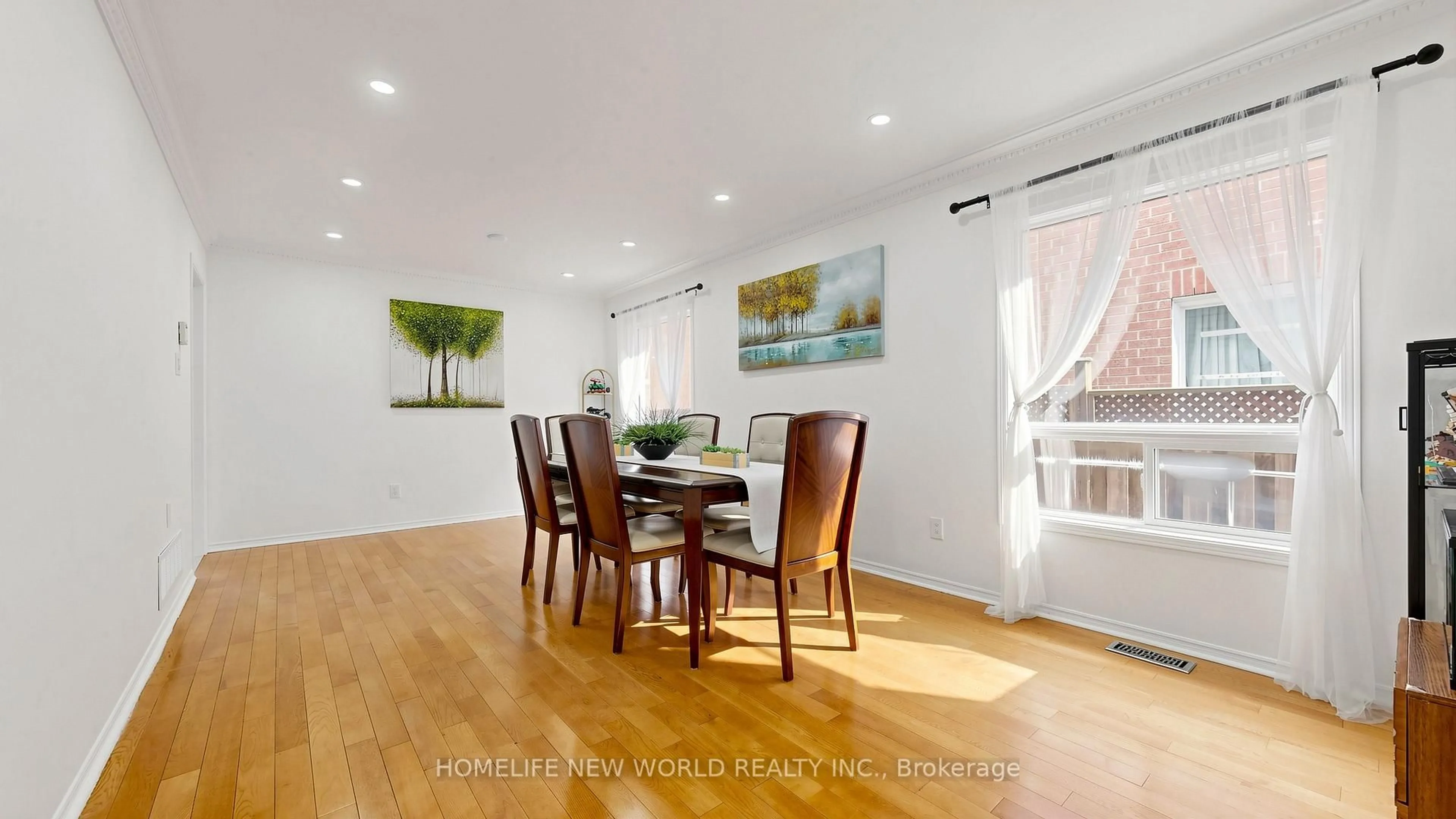 Dining room, wood/laminate floor for 73 Doubtfire Cres, Markham Ontario L3S 3V4