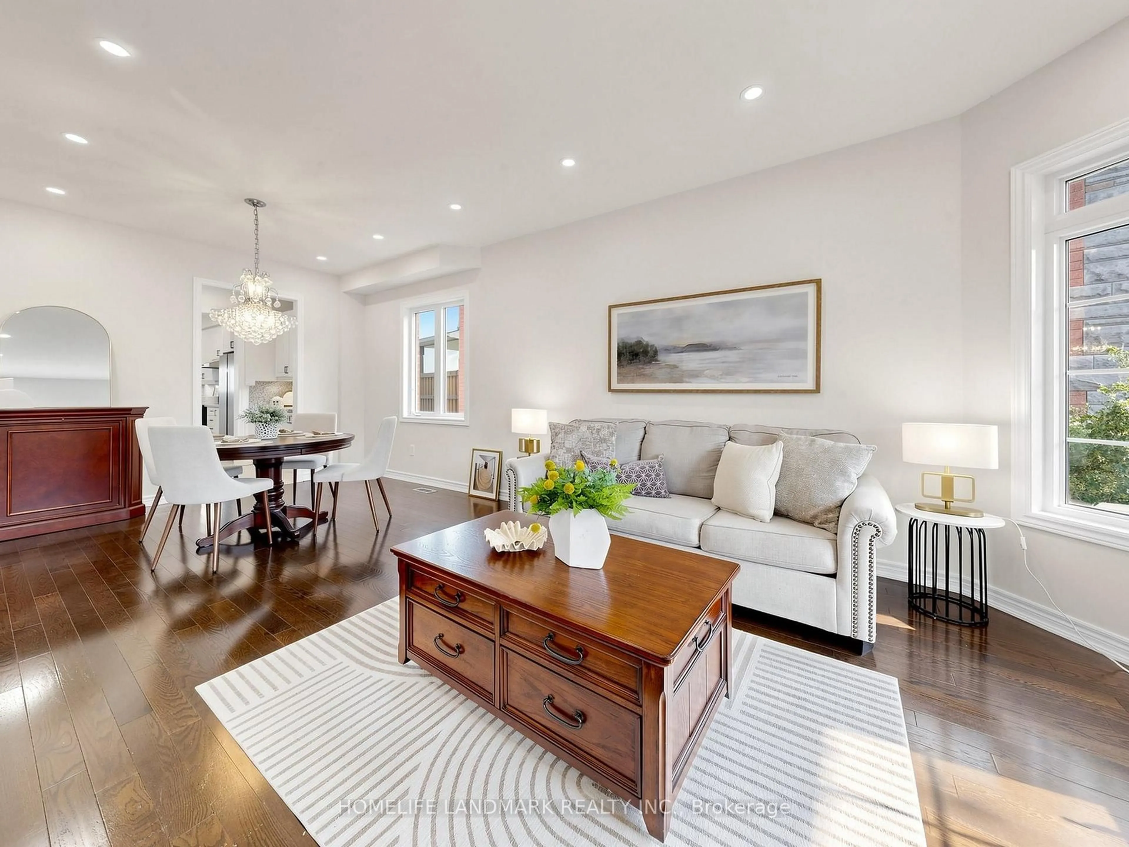 Living room with furniture, wood/laminate floor for 75 Pointon St, Aurora Ontario L4G 0J9