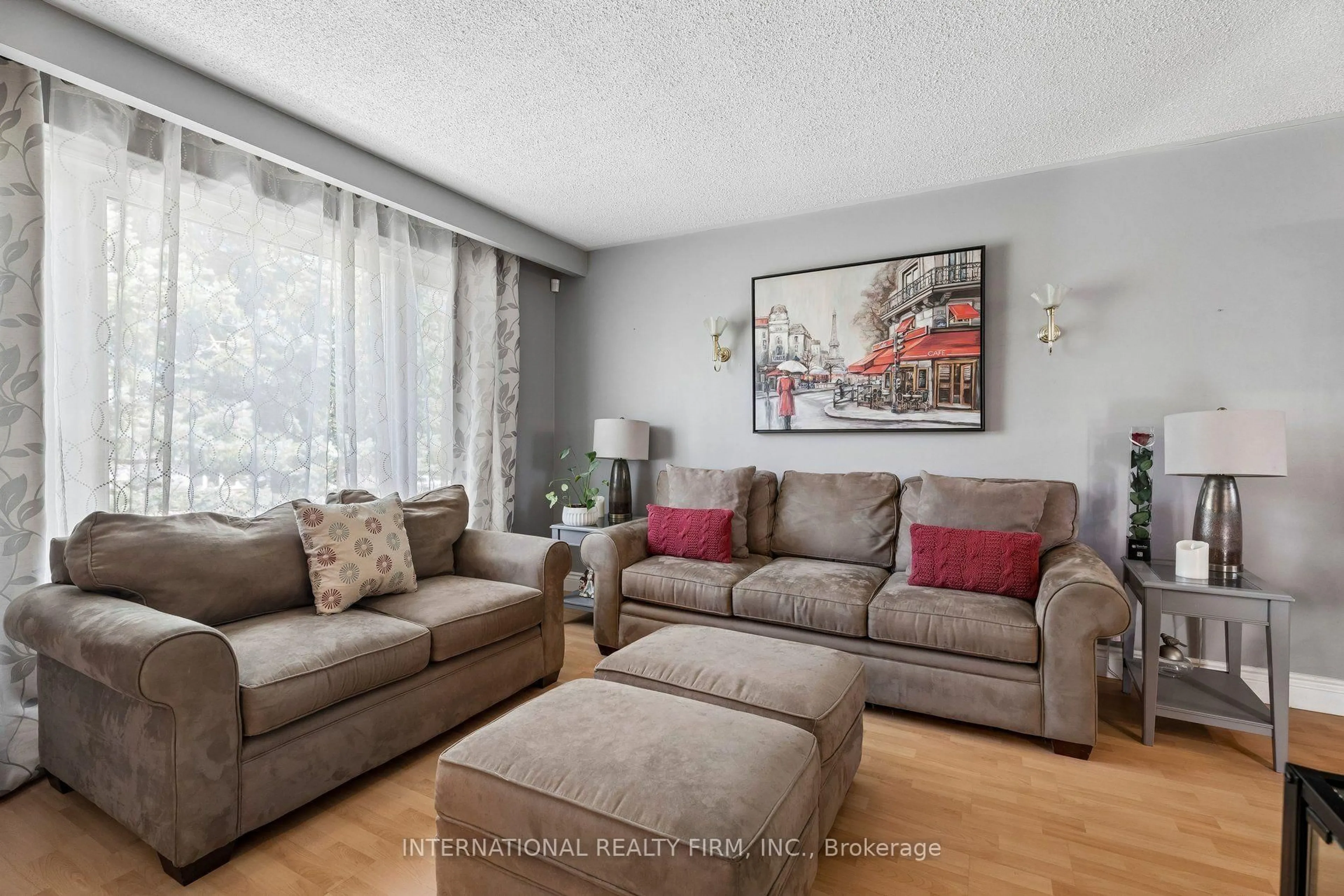 Living room with furniture, wood/laminate floor for 29 Jamieson Dr, Adjala-Tosorontio Ontario L0N 1R0
