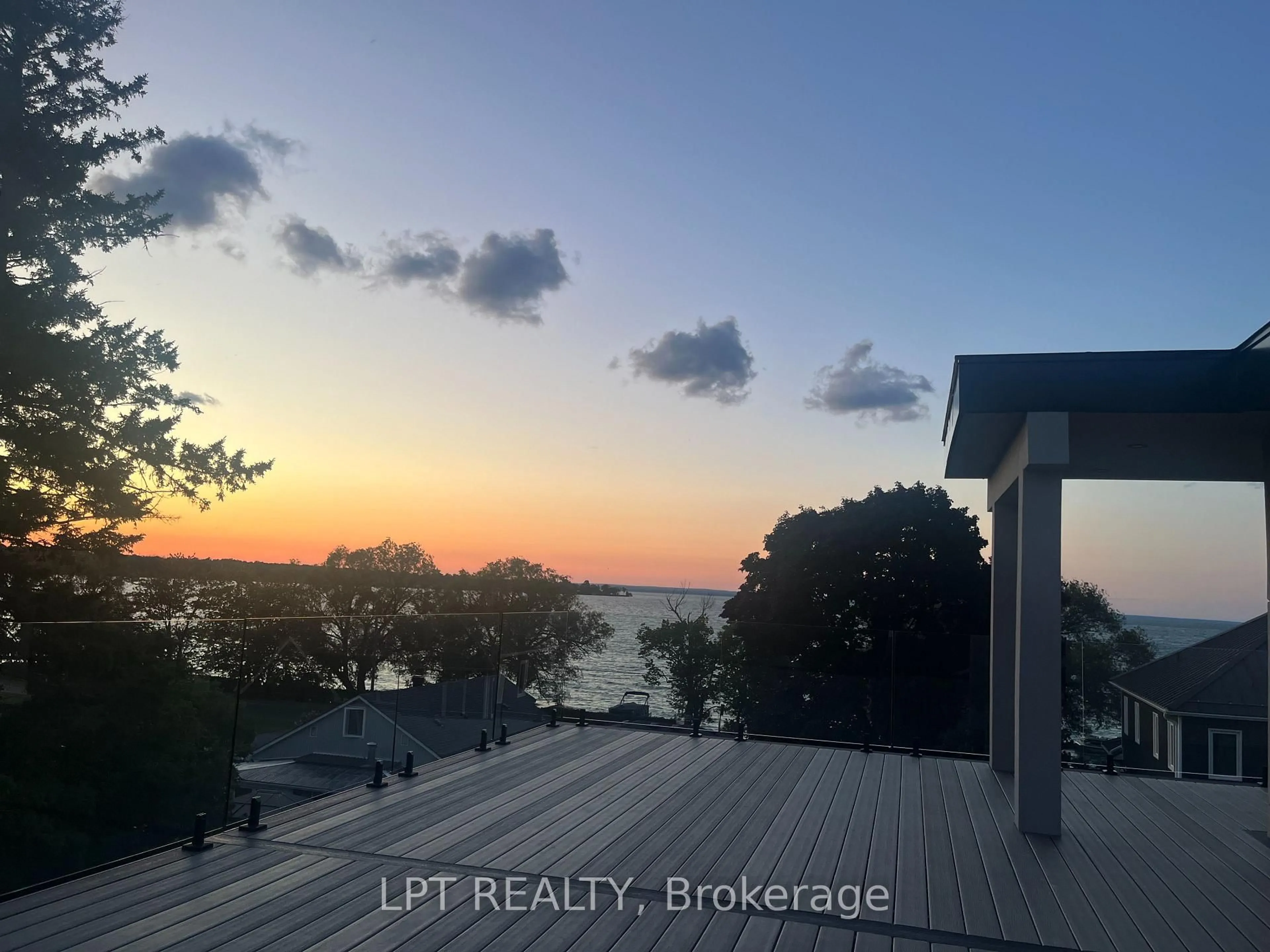 A pic from outside/outdoor area/front of a property/back of a property/a pic from drone, water/lake/river/ocean view for 838 Elmwood St, Georgina Ontario L4P 3E9