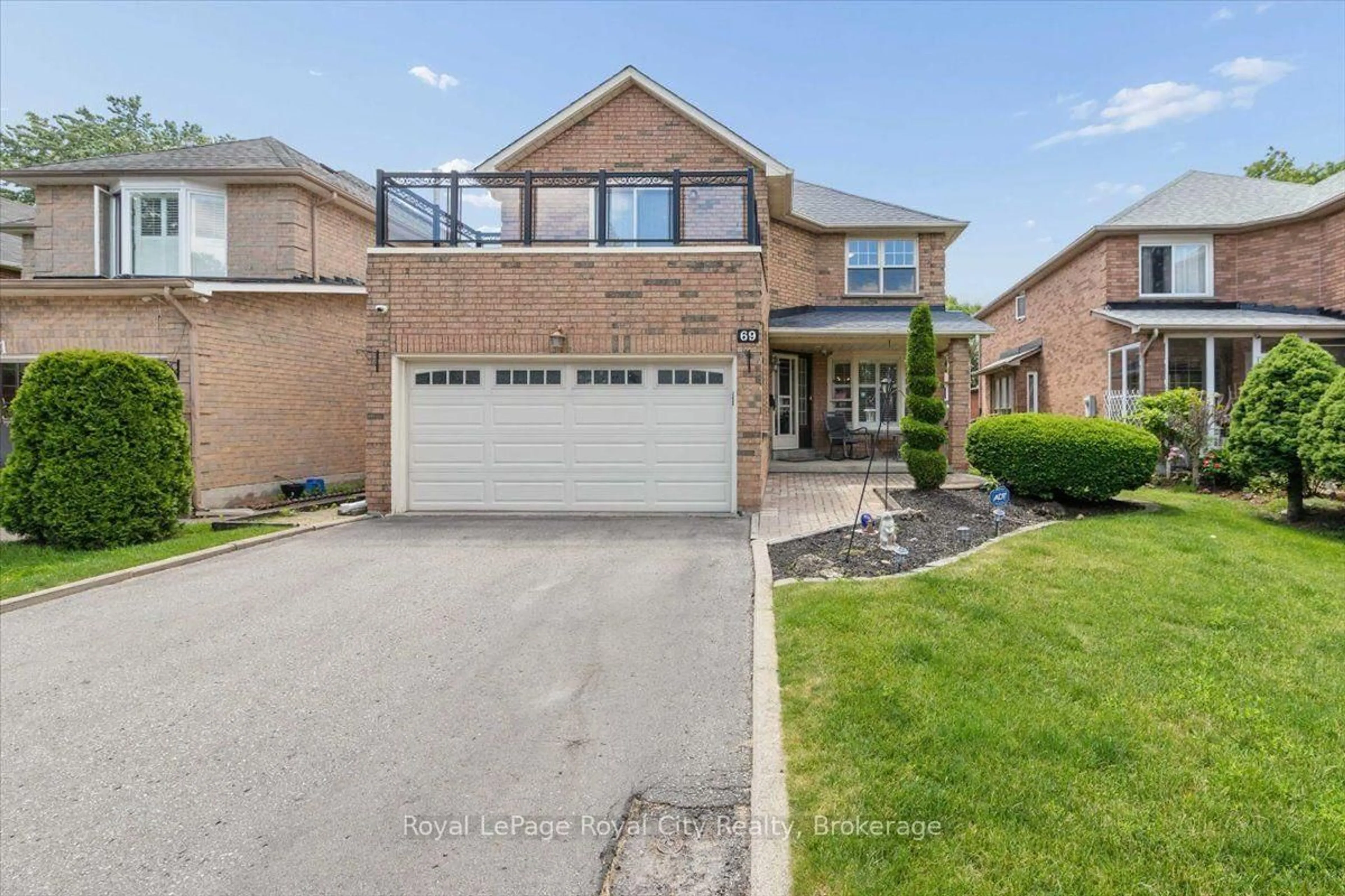 Home with brick exterior material, street for 69 Summerdale Dr, Markham Ontario L3T 6W6