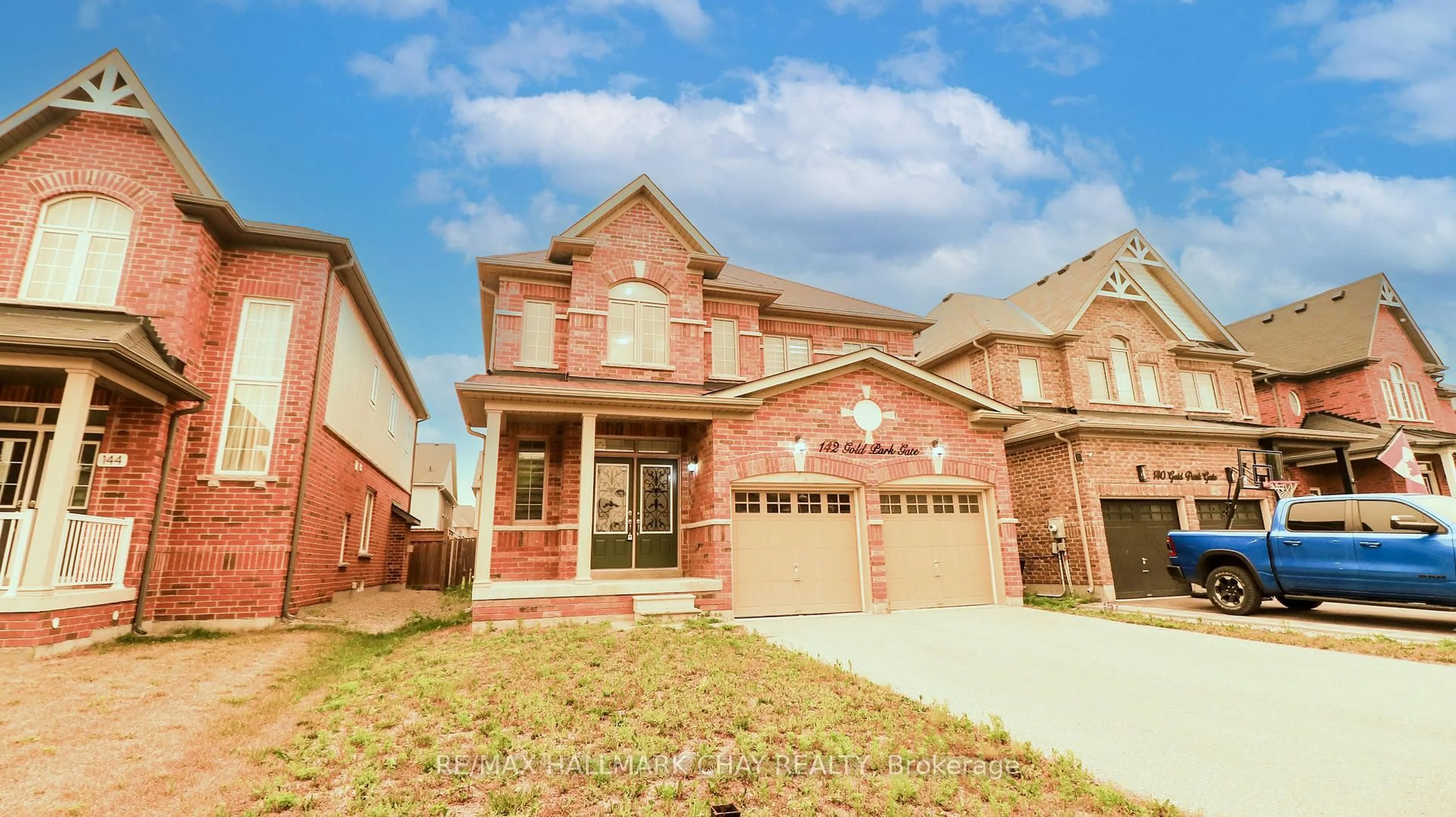 Home with brick exterior material, street for 142 Gold Park Gate, Essa Ontario L3W 0B4