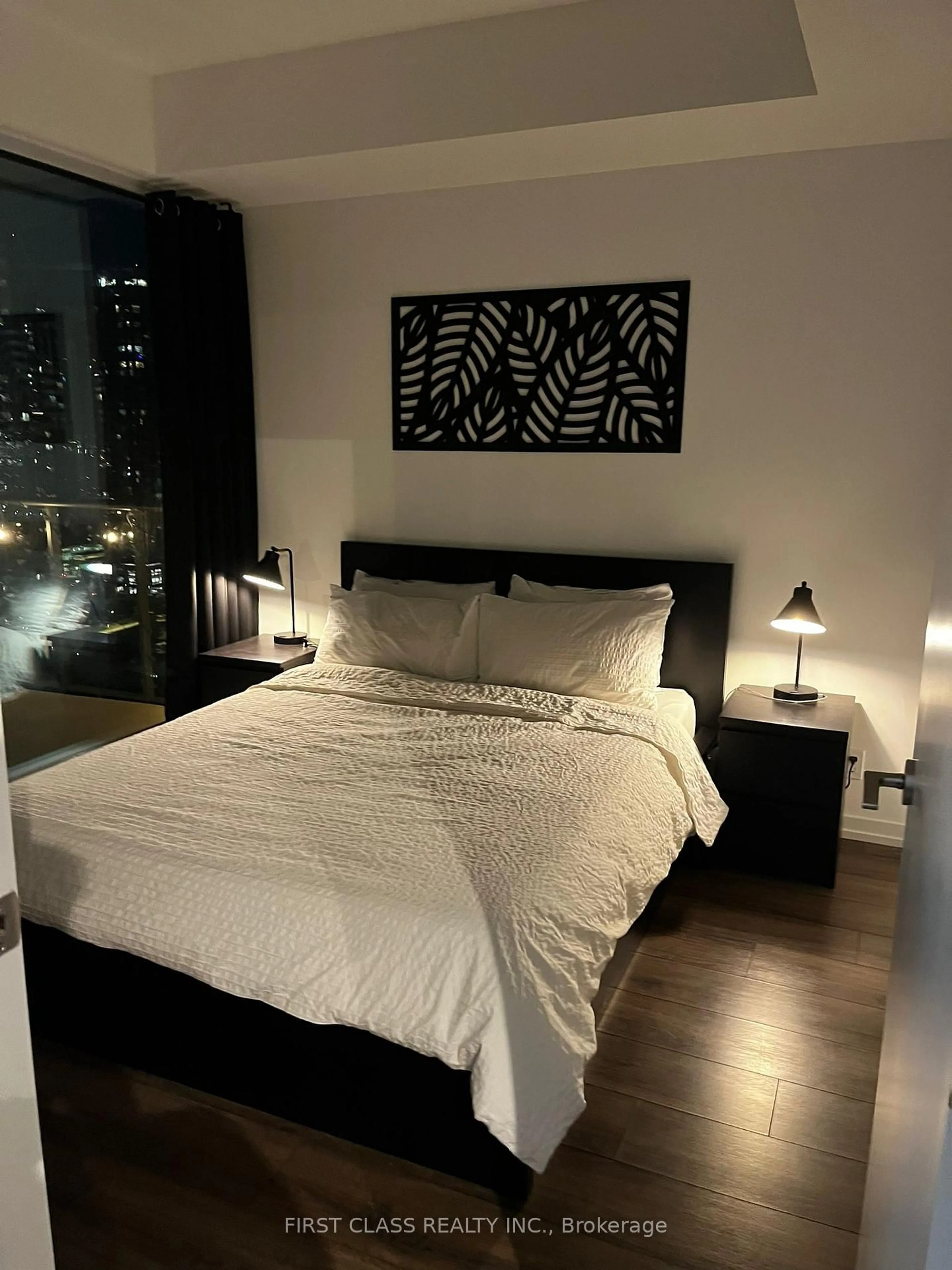 Bedroom with bed, wood/laminate floor for 7890 Jane St #2111, Vaughan Ontario L4K 0K9