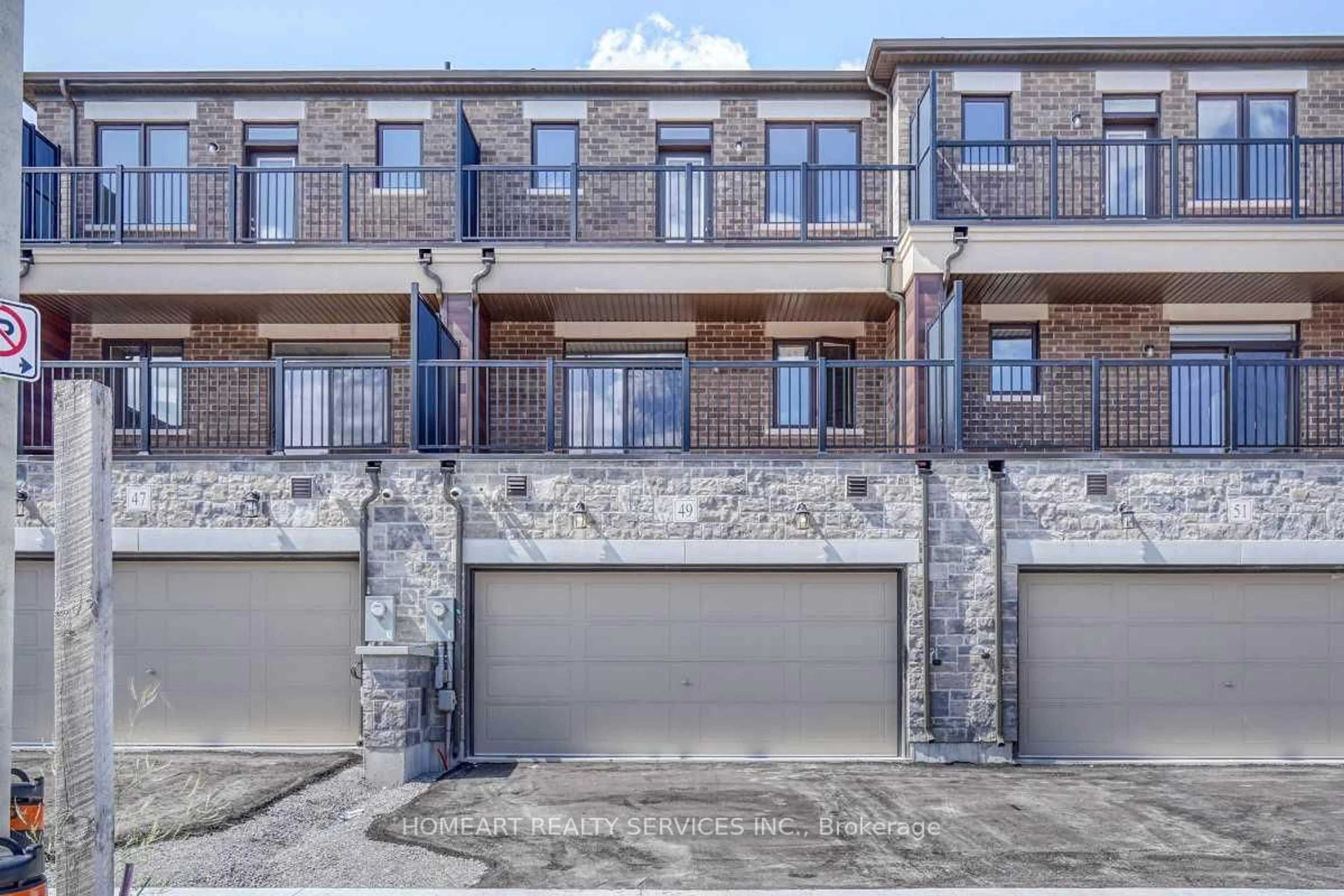 Home with brick exterior material, street for 49 Mumbai Dr, Markham Ontario L3S 0G1