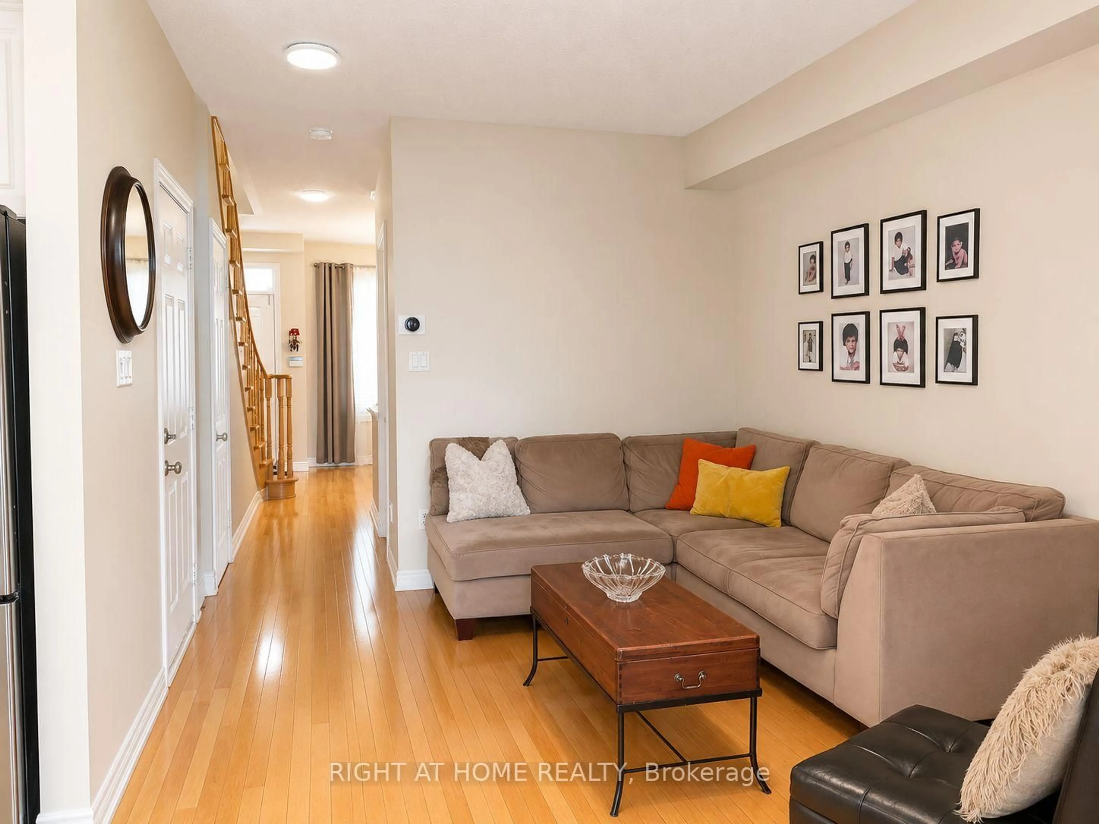 Living room with furniture, wood/laminate floor for 39 Pexton Ave, Richmond Hill Ontario L4E 4Y4