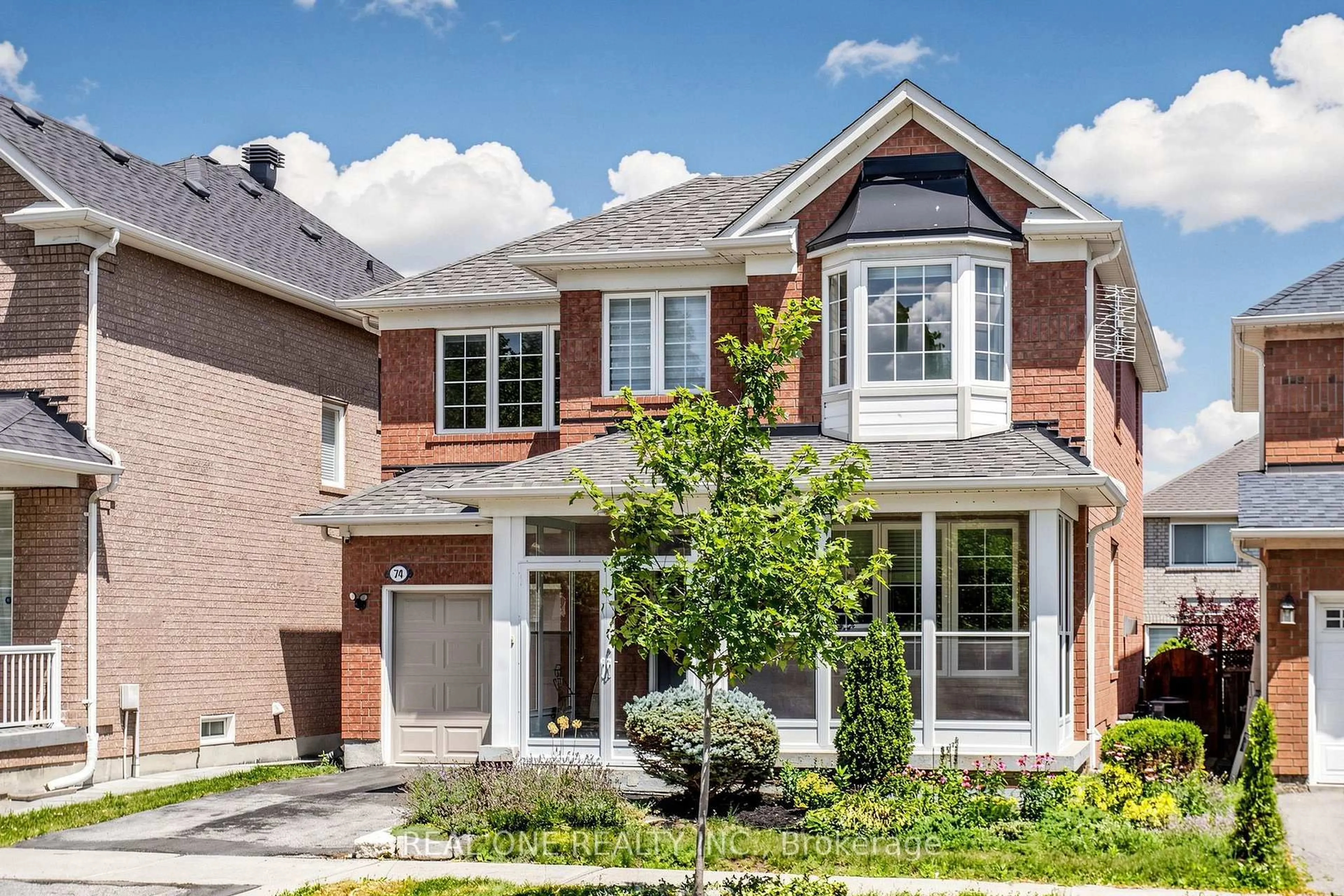 Home with brick exterior material, street for 74 Trojan Cres, Markham Ontario L6C 2N4