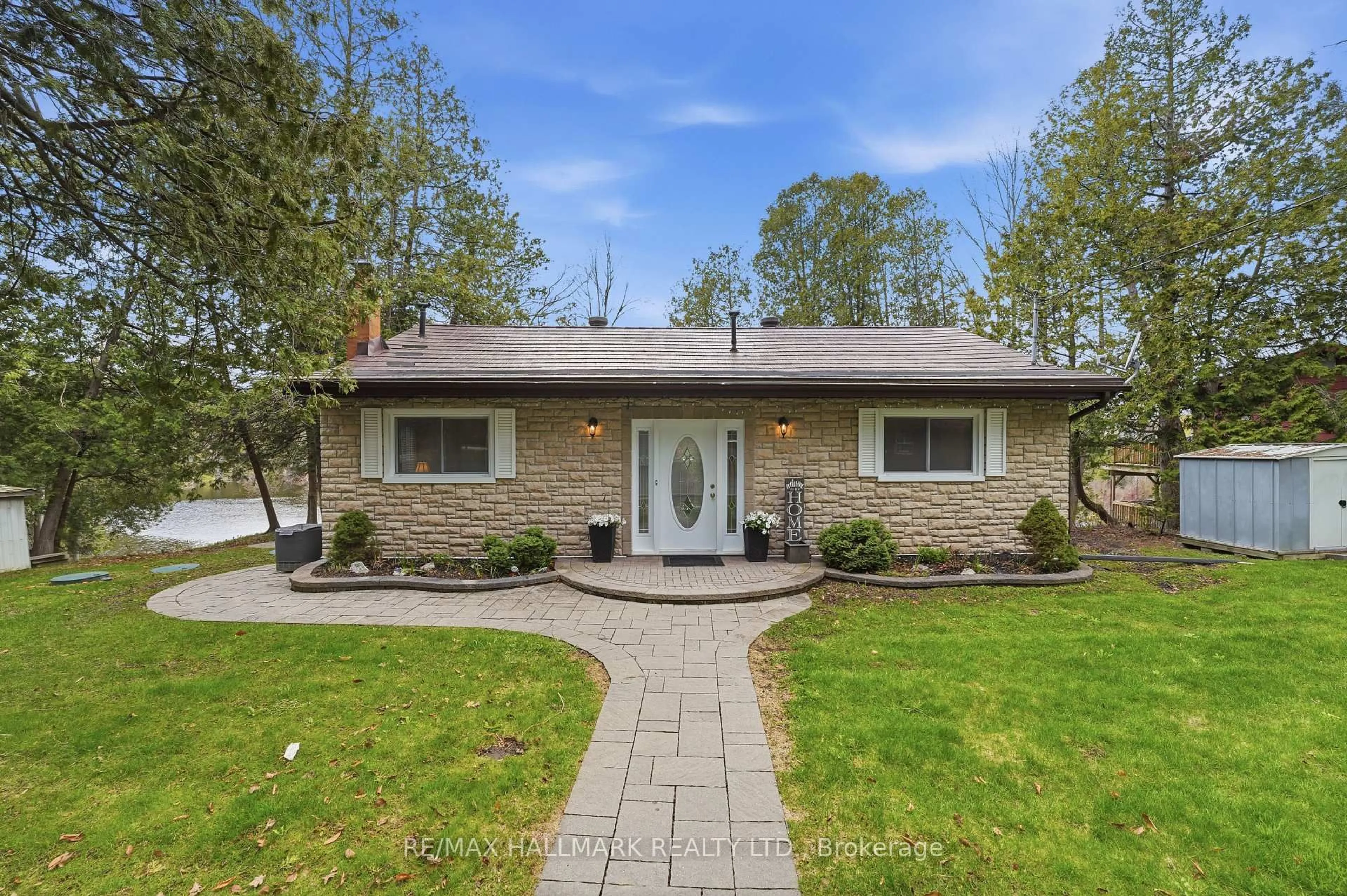 Home with brick exterior material, street for 104 Riverbank Dr, Georgina Ontario L0E 1N0