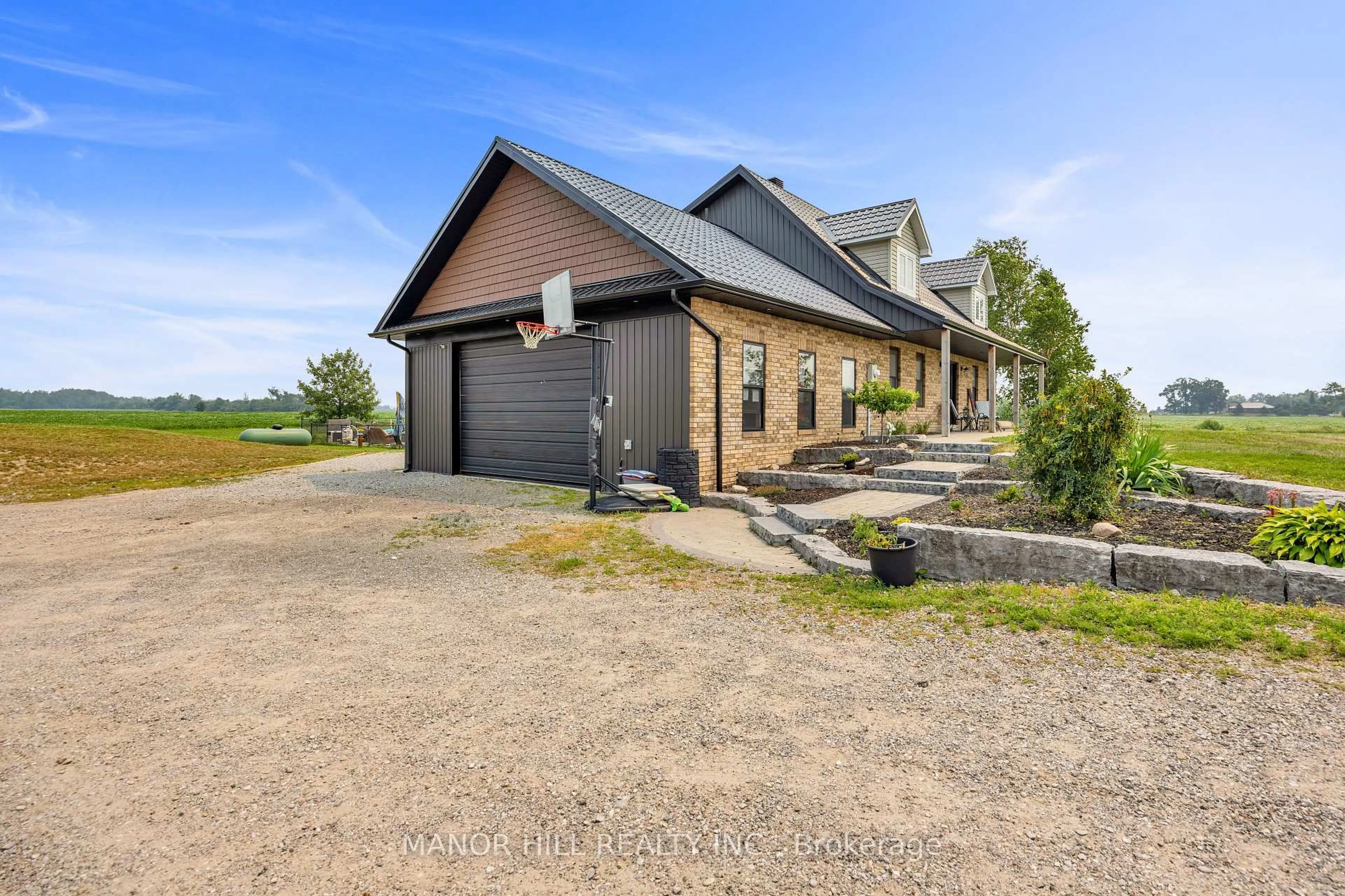 A pic from outside/outdoor area/front of a property/back of a property/a pic from drone, unknown for 6111 10th Line, Essa Ontario L0L 2N0