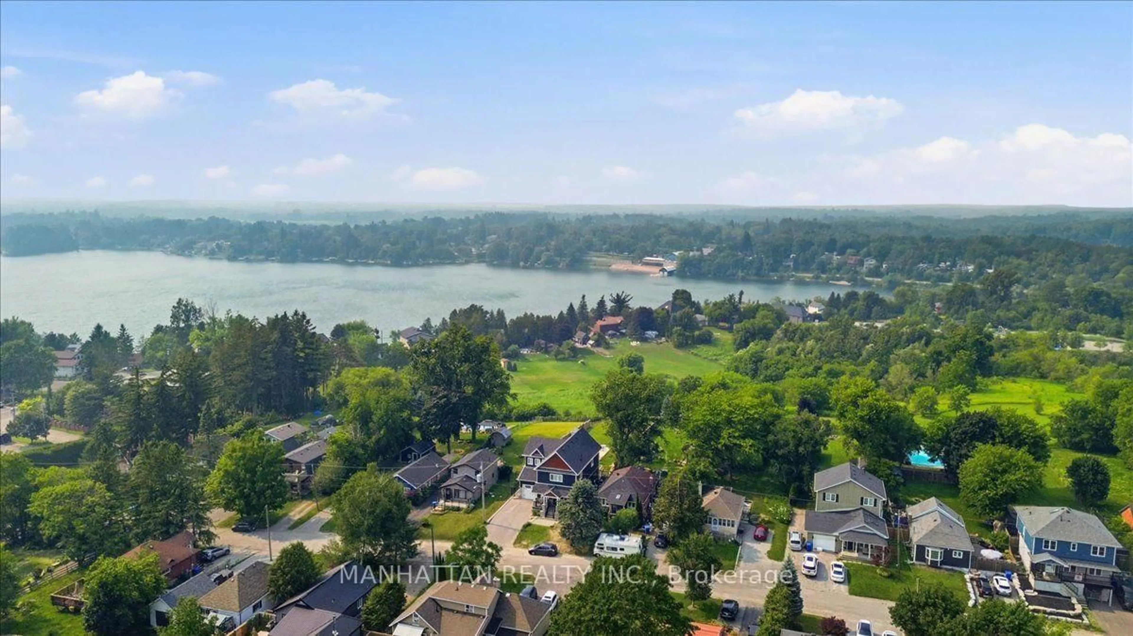 A pic from outside/outdoor area/front of a property/back of a property/a pic from drone, water/lake/river/ocean view for 10 Victor Dr, Whitchurch-Stouffville Ontario L4A 3G5