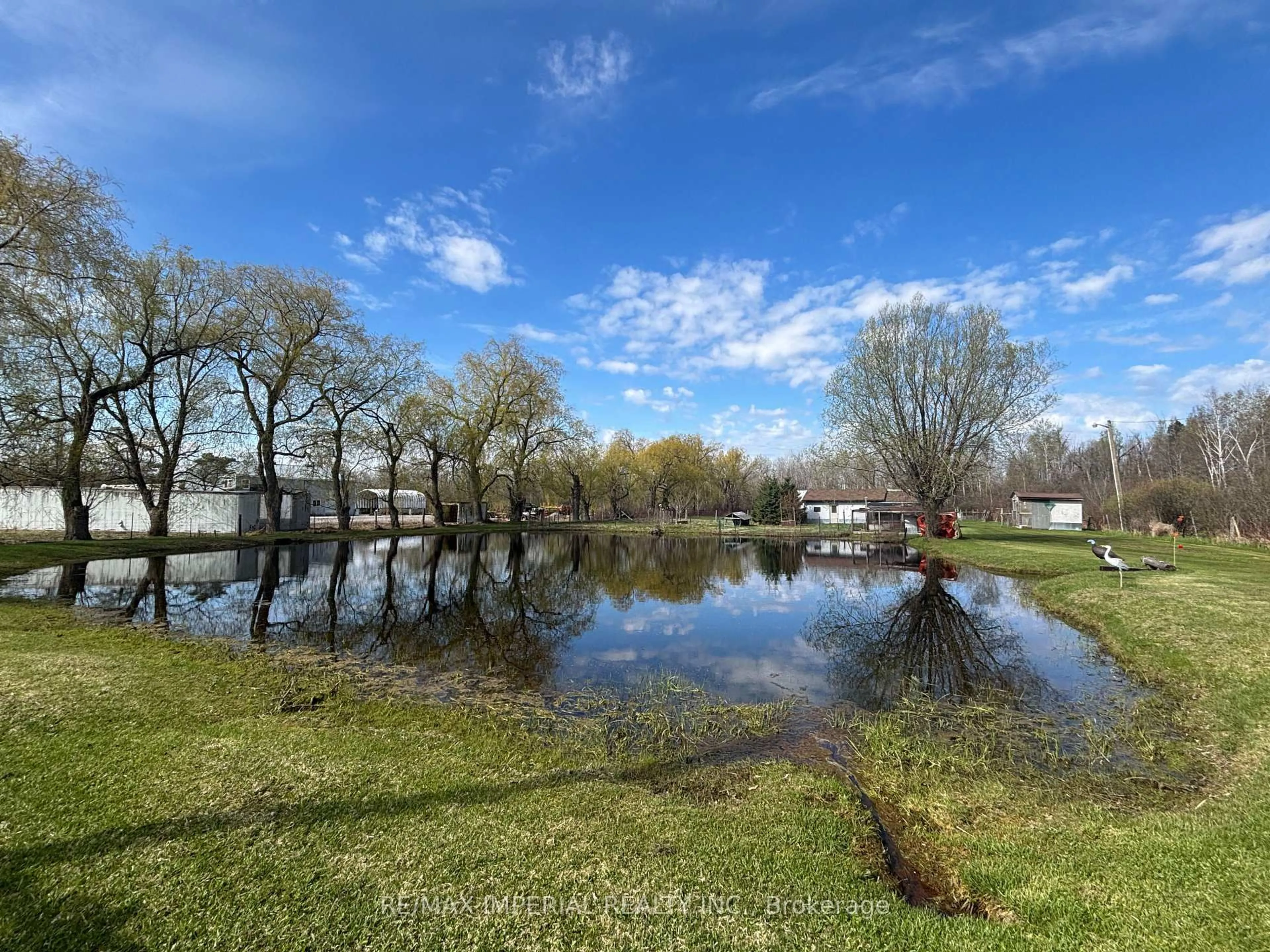 A pic from outside/outdoor area/front of a property/back of a property/a pic from drone, water/lake/river/ocean view for 23276 Highway 48 Rd, Georgina Ontario L0E 1L0