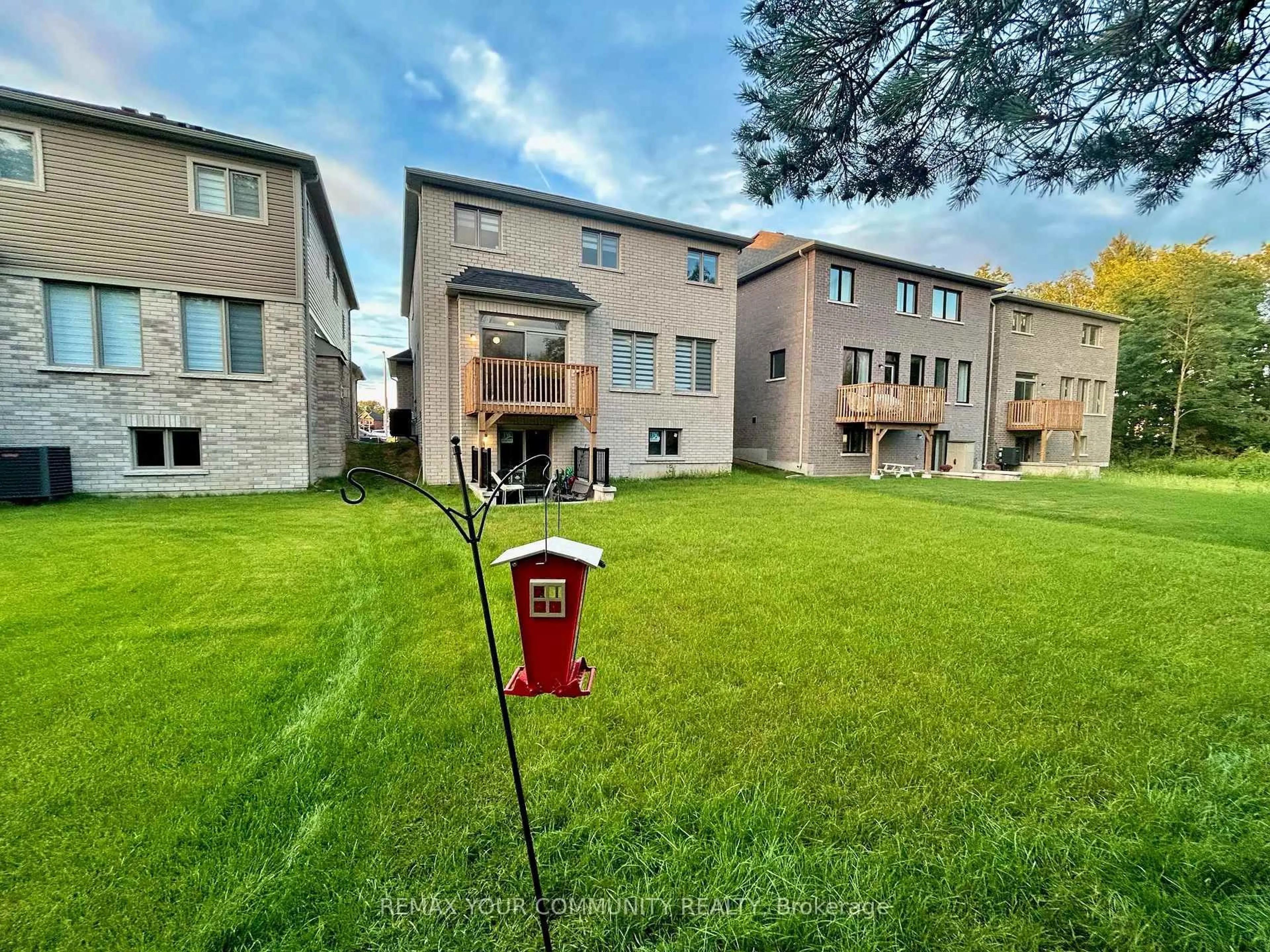 A pic from outside/outdoor area/front of a property/back of a property/a pic from drone, street for 24 Baycroft Blvd, Essa Ontario L0M 1B5