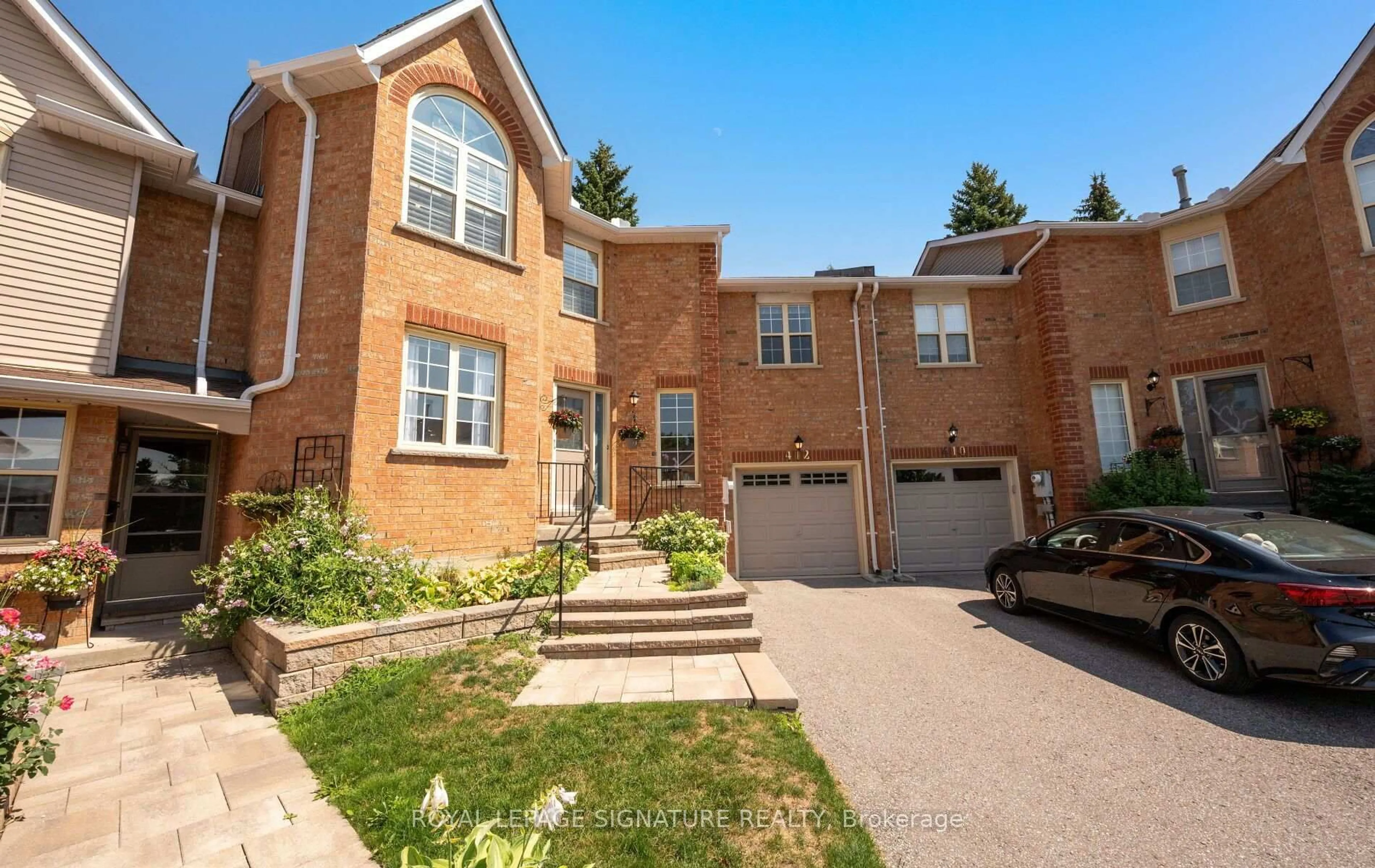 Home with brick exterior material, street for 412 Butler Crt, Aurora Ontario L4G 6G8