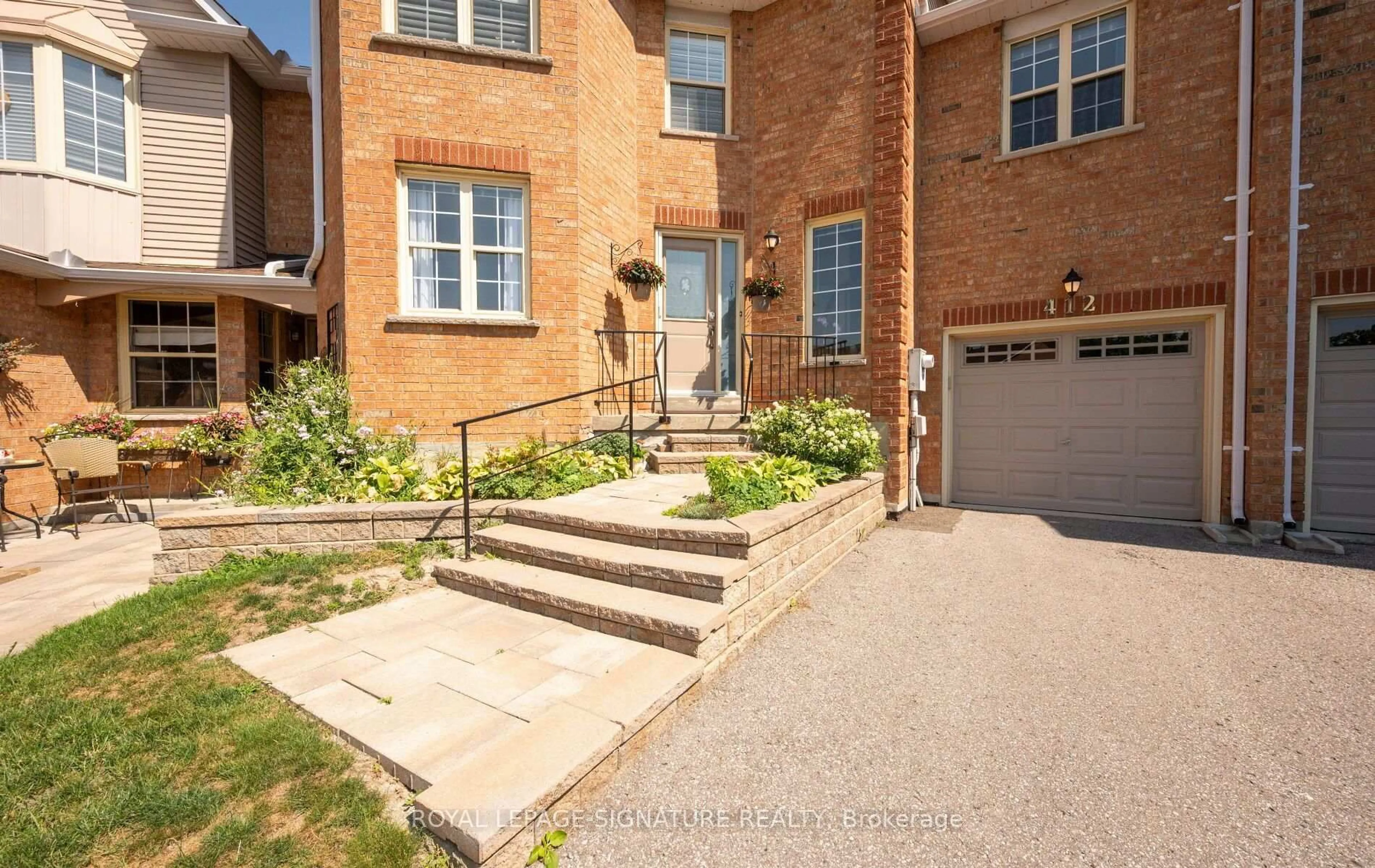 Home with brick exterior material, street for 412 Butler Crt, Aurora Ontario L4G 6G8